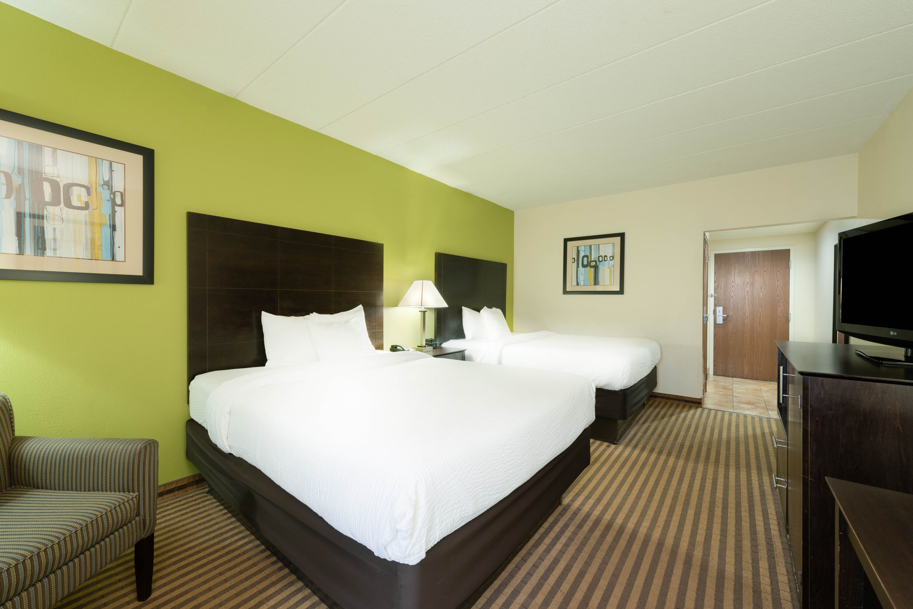 Guest room at the La Quinta Inn & Suites by Wyndham Columbus - Grove City in Grove City, Ohio