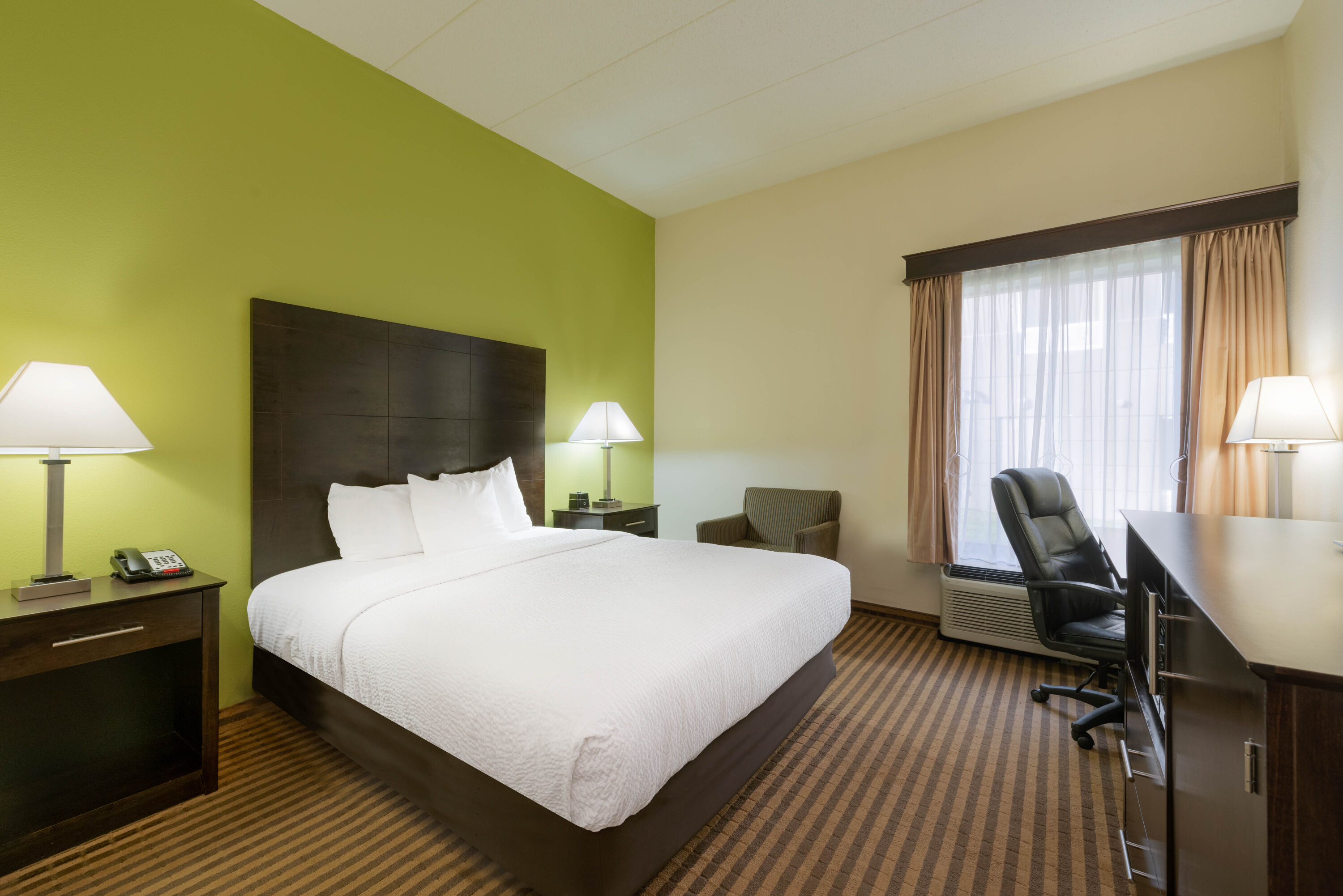 Guest room at the La Quinta Inn & Suites by Wyndham Columbus - Grove City in Grove City, Ohio