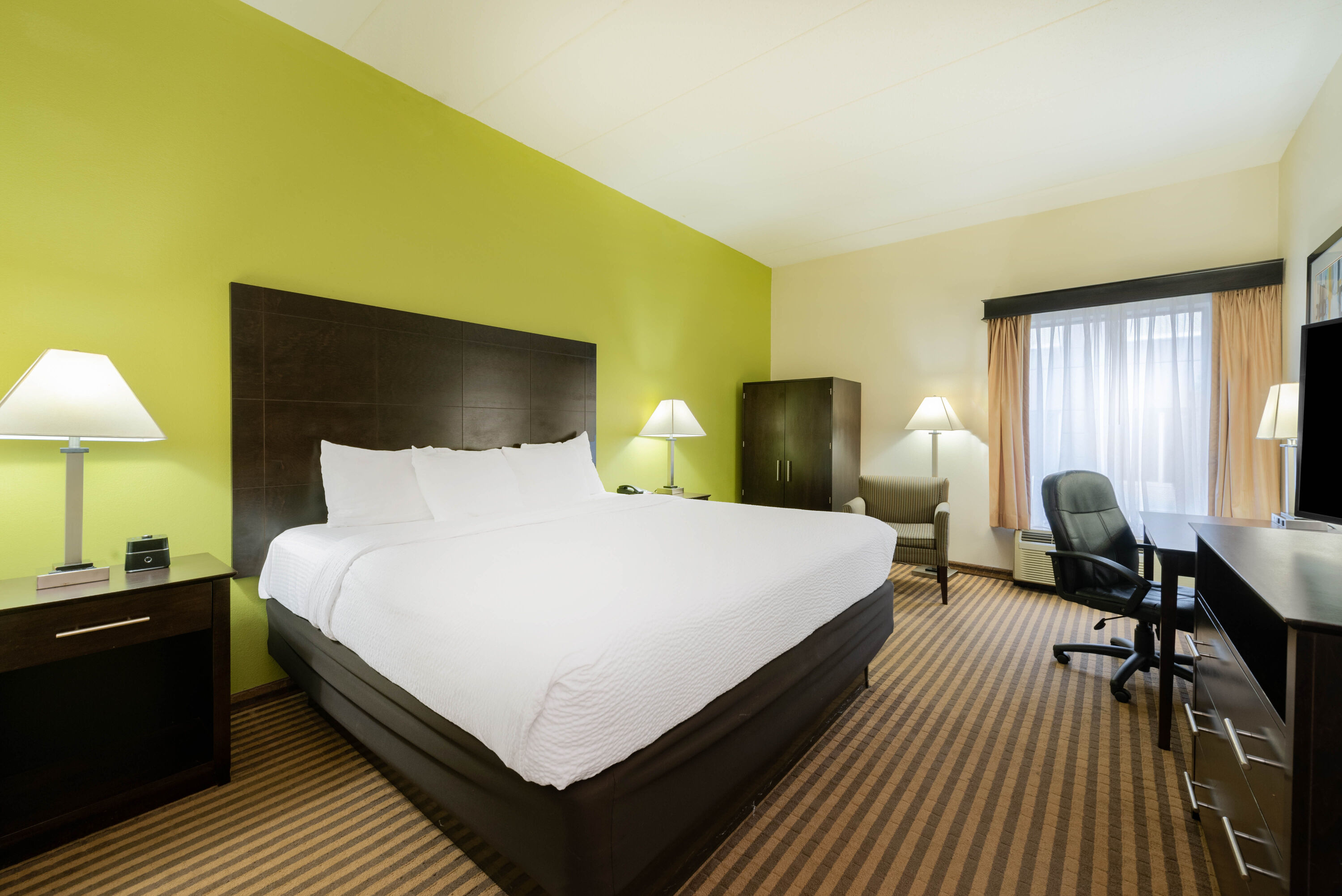 Guest room at the La Quinta Inn & Suites by Wyndham Columbus - Grove City in Grove City, Ohio