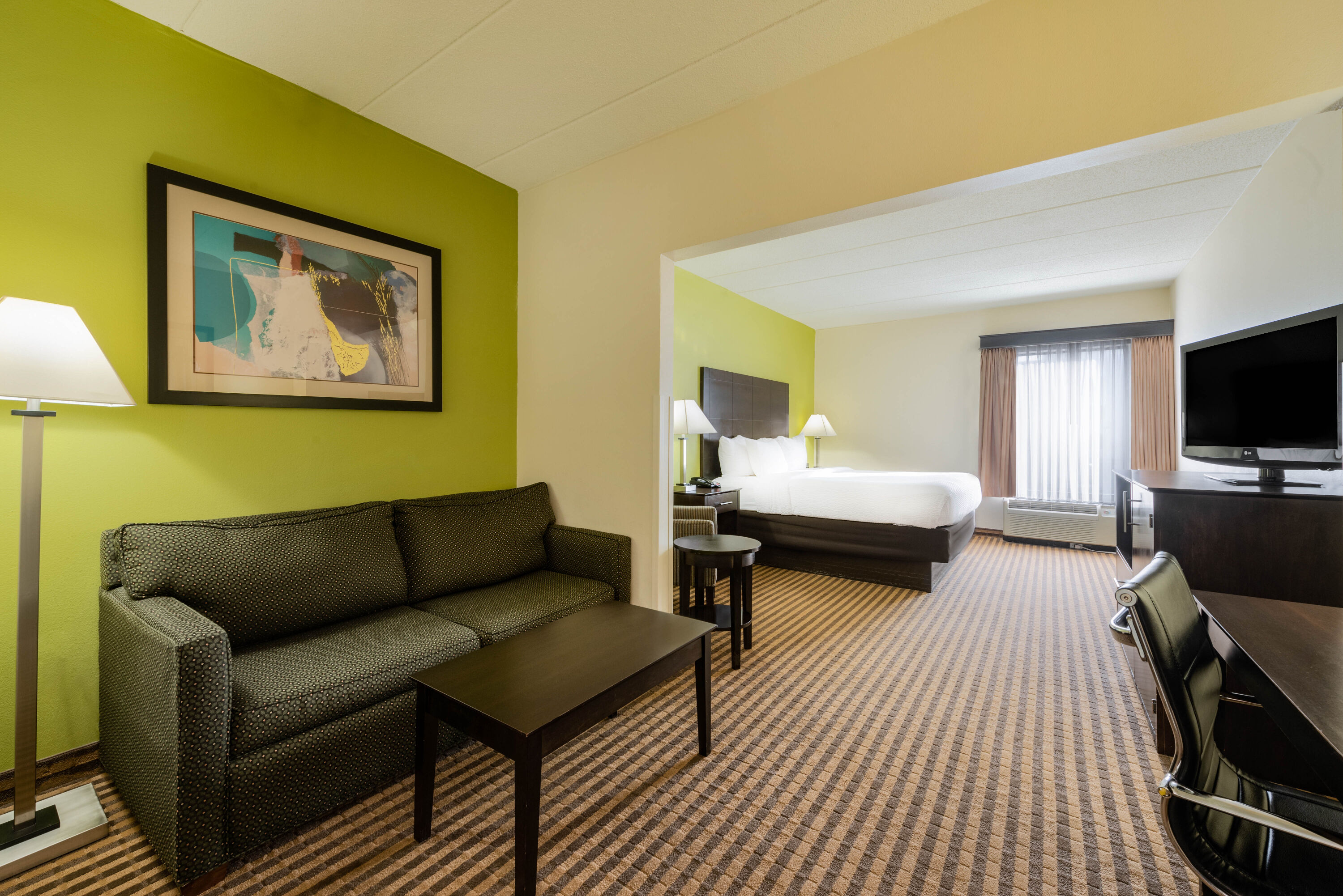 Guest room at the La Quinta Inn & Suites by Wyndham Columbus - Grove City in Grove City, Ohio