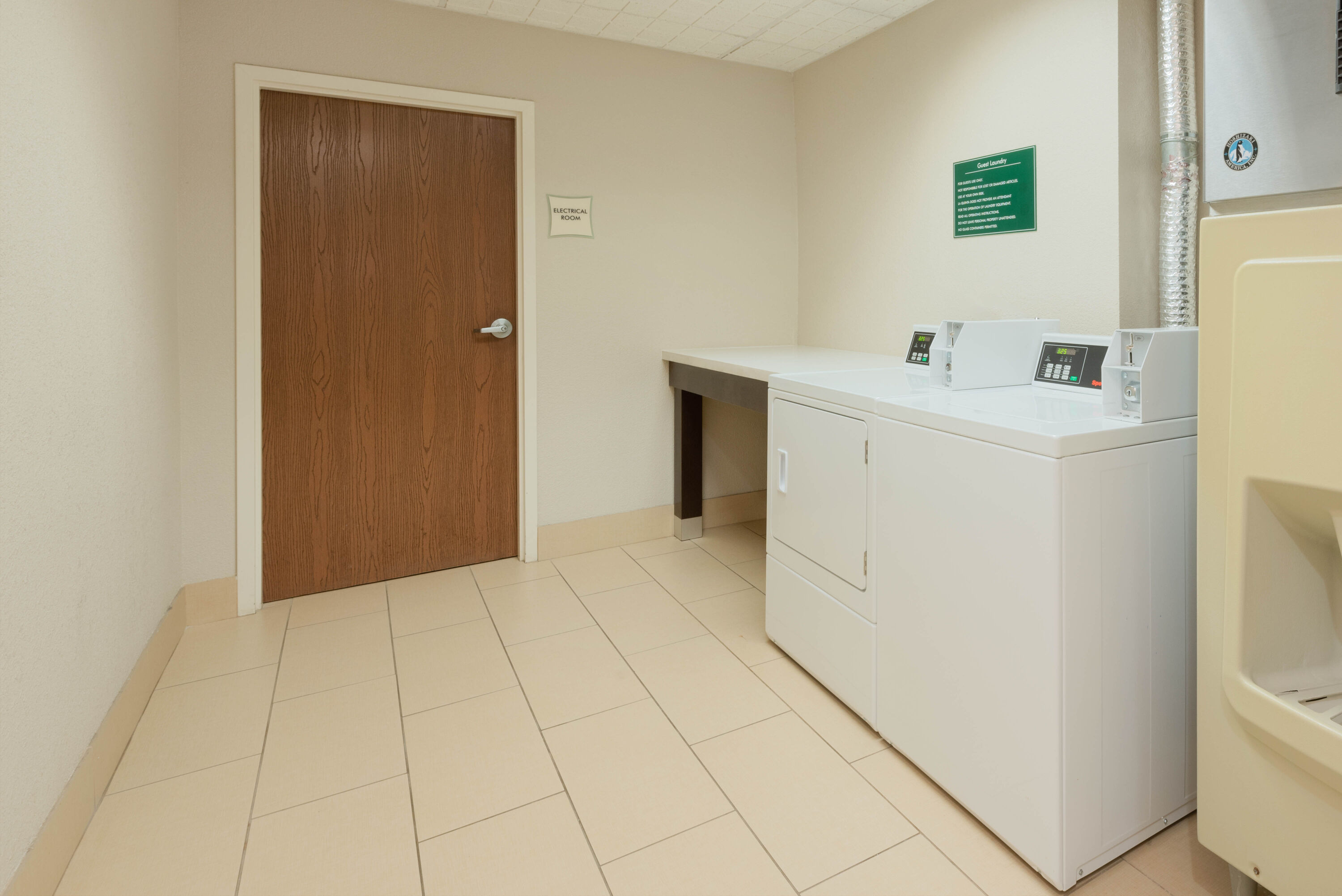 Laundry facilities at La Quinta Inn & Suites by Wyndham Columbus - Grove City in Grove City, Ohio