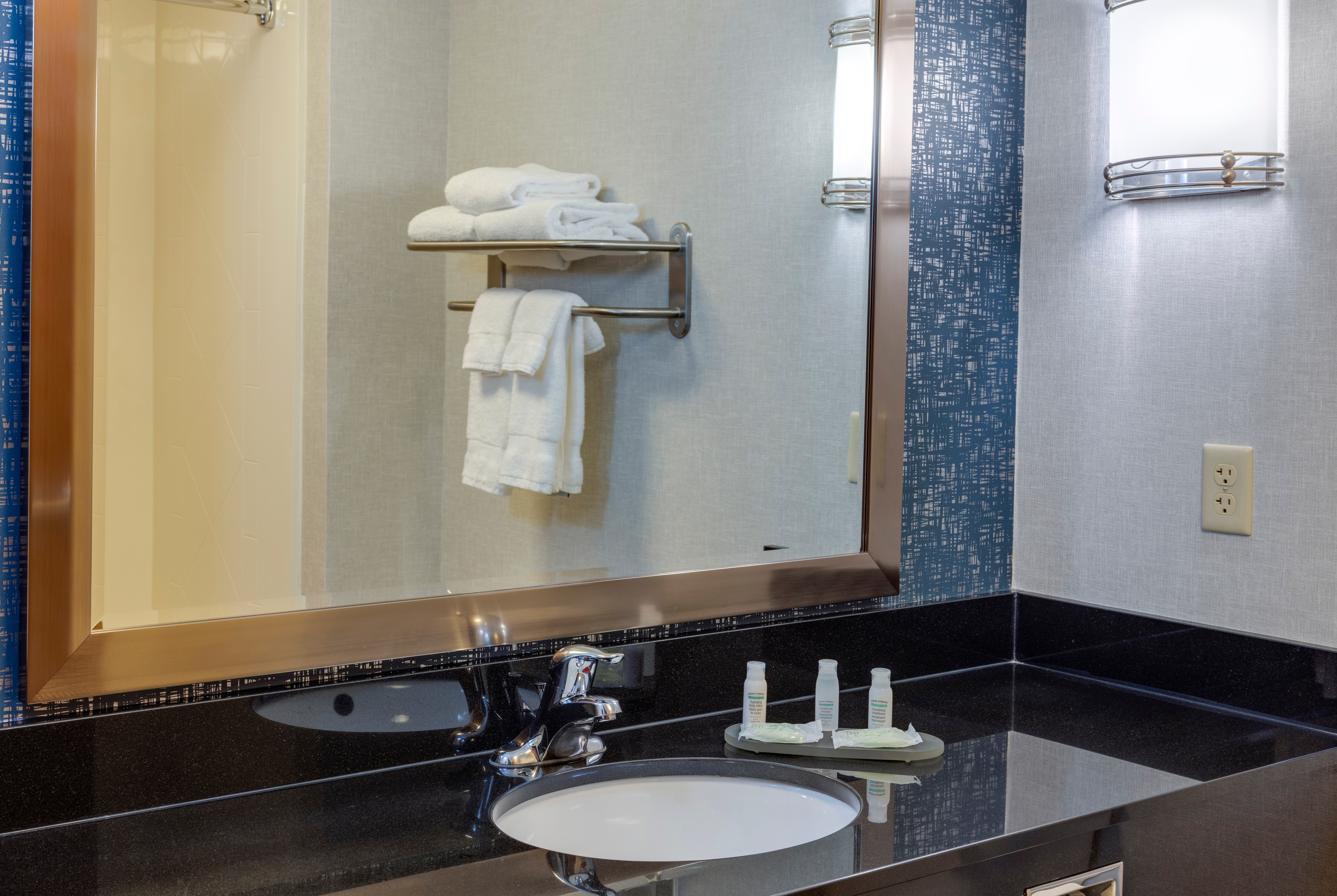 Guest room bath at the La Quinta Inn & Suites by Wyndham Edmond in Edmond, Oklahoma