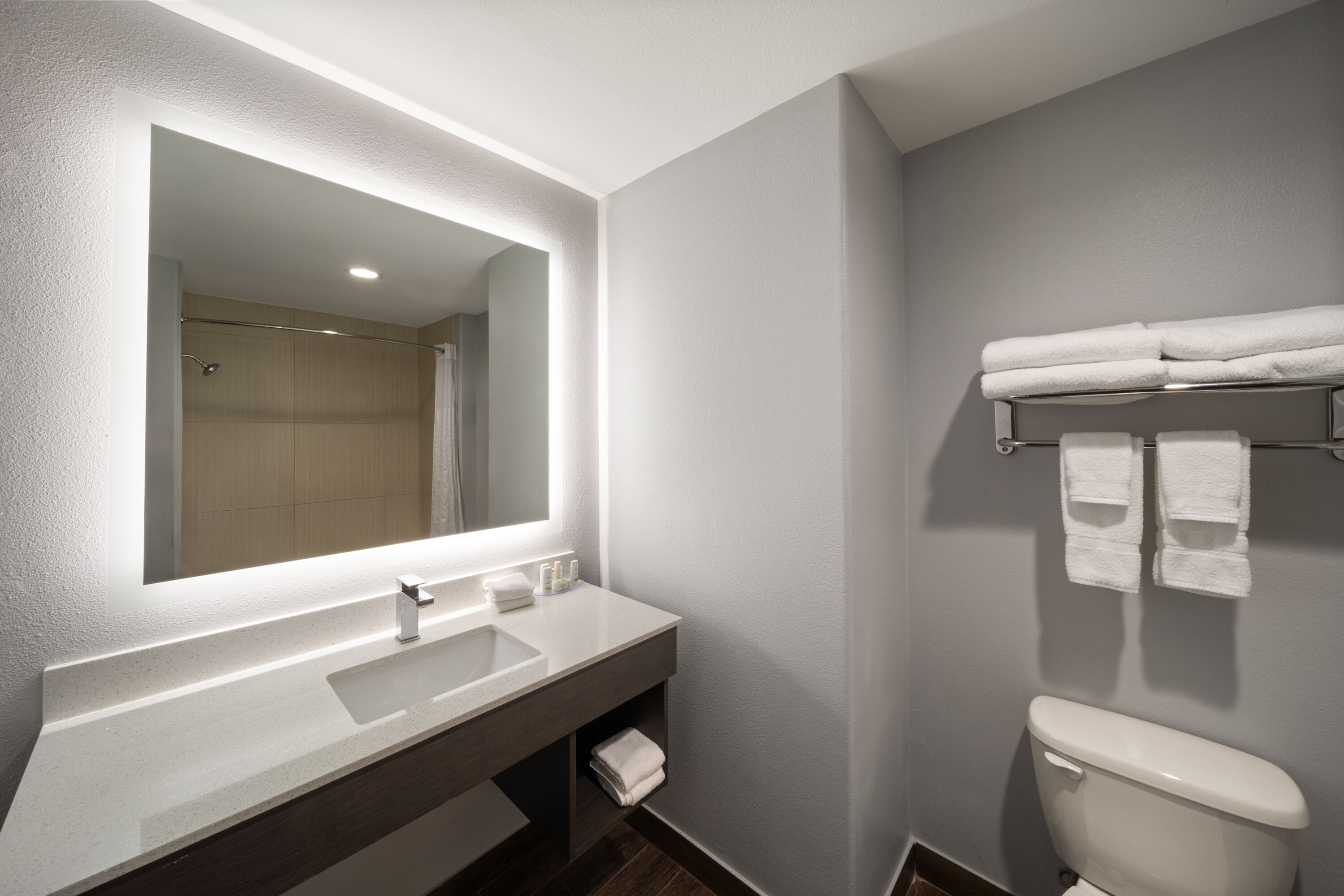 Guest room bath at the La Quinta Inn & Suites by Wyndham McAlester in McAlester, Oklahoma