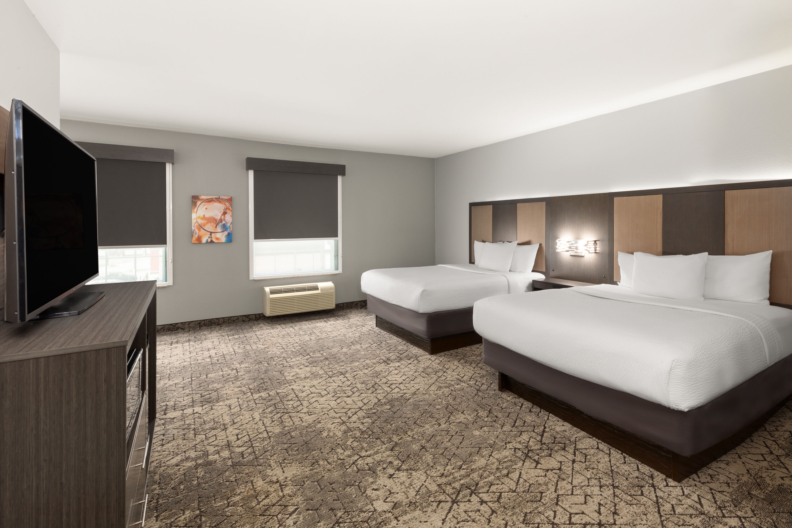 Guest room at the La Quinta Inn & Suites by Wyndham McAlester in McAlester, Oklahoma