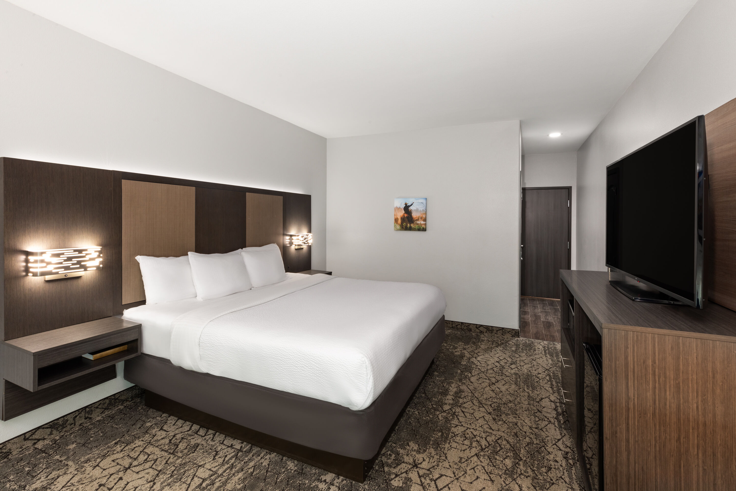 Guest room at the La Quinta Inn & Suites by Wyndham McAlester in McAlester, Oklahoma