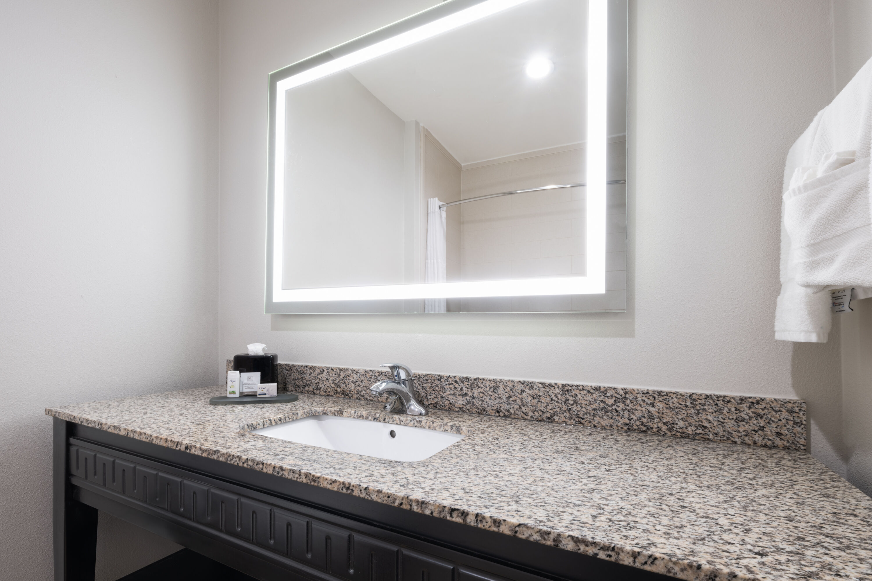 Guest room bath at the La Quinta Inn & Suites by Wyndham Muskogee in Muskogee, Oklahoma