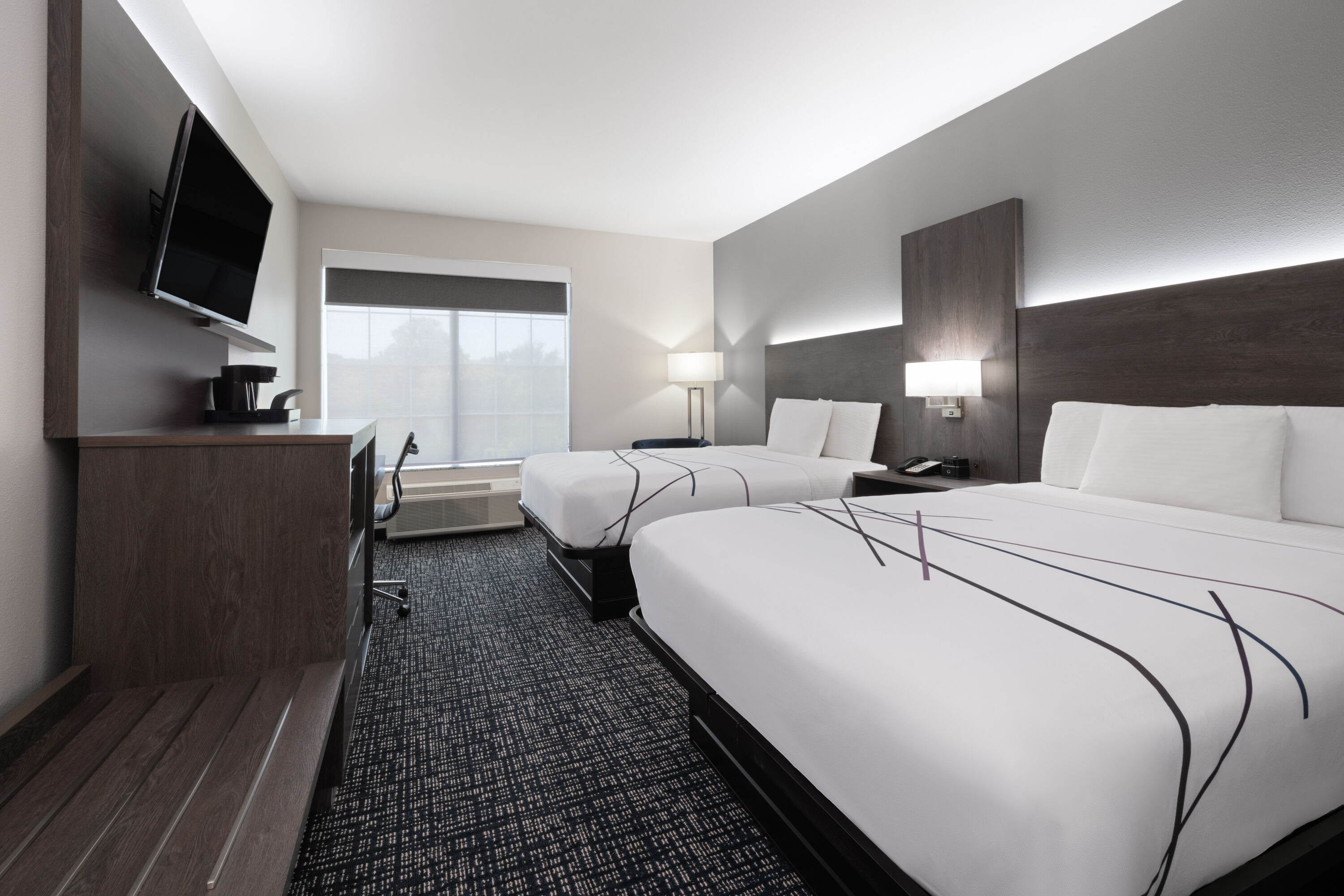 Guest room at the La Quinta Inn & Suites by Wyndham Muskogee in Muskogee, Oklahoma