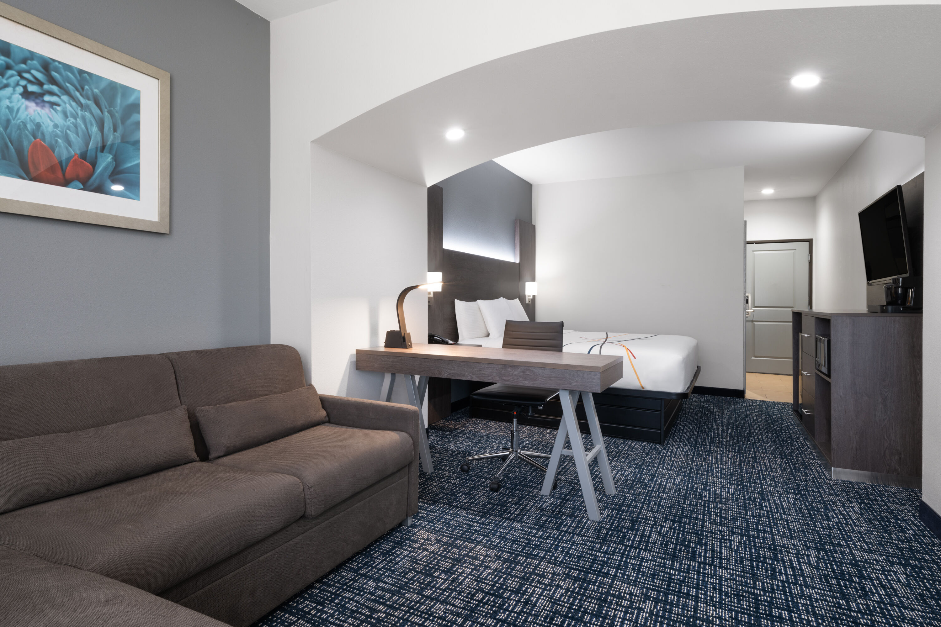 Guest room at the La Quinta Inn & Suites by Wyndham Muskogee in Muskogee, Oklahoma