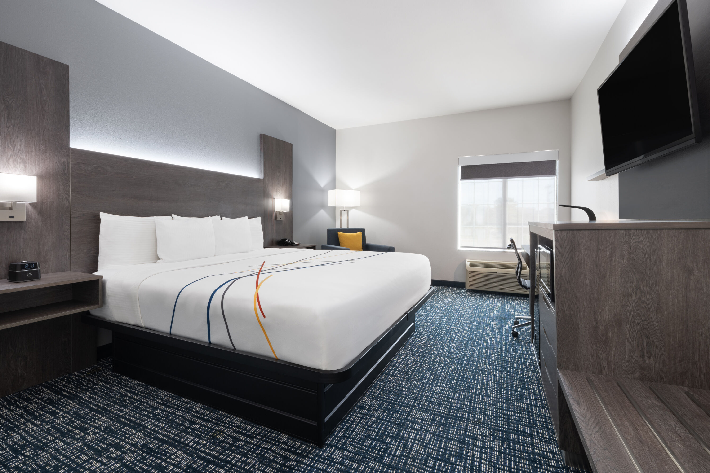 Guest room at the La Quinta Inn & Suites by Wyndham Muskogee in Muskogee, Oklahoma