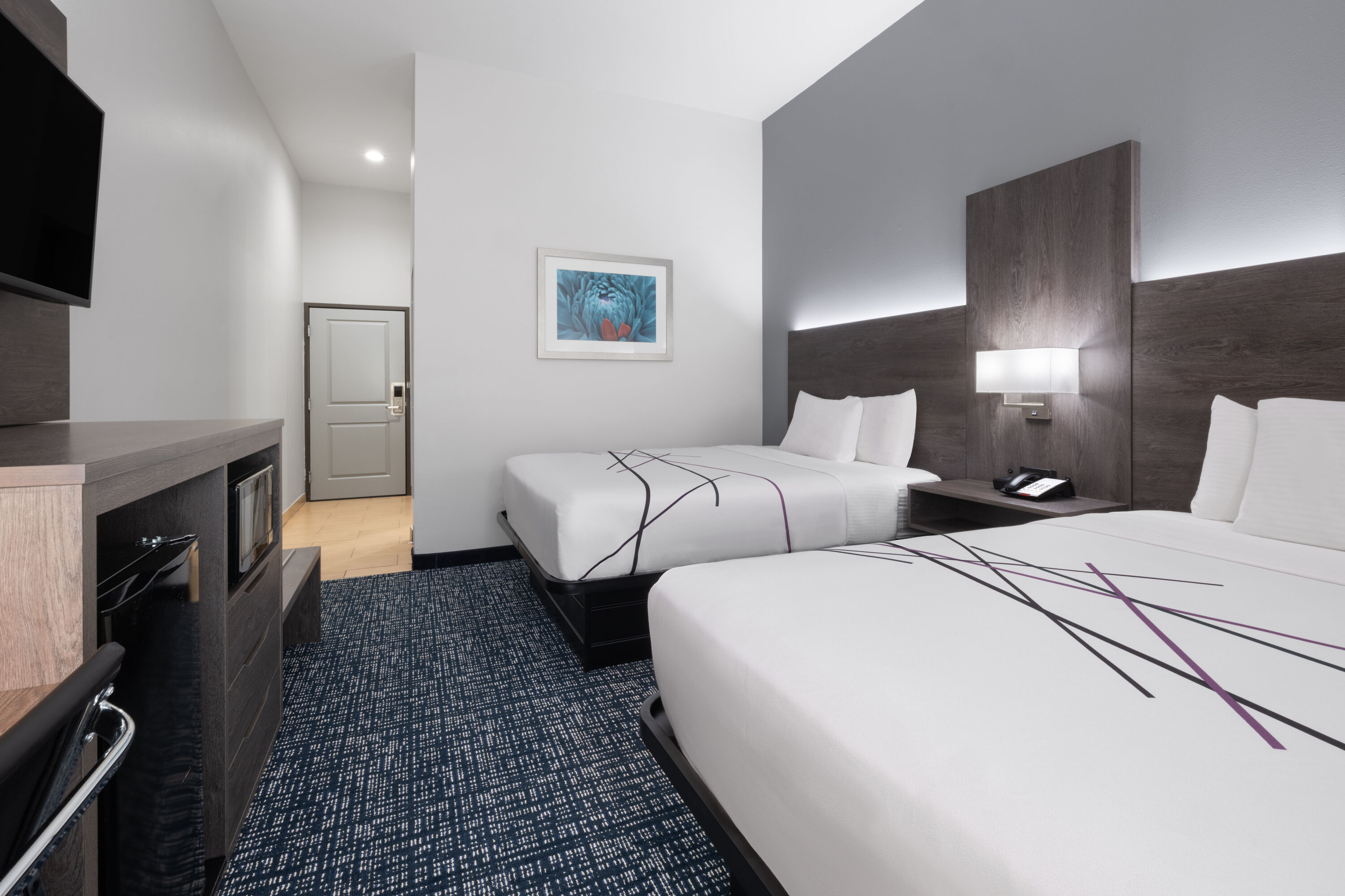 Guest room at the La Quinta Inn & Suites by Wyndham Muskogee in Muskogee, Oklahoma