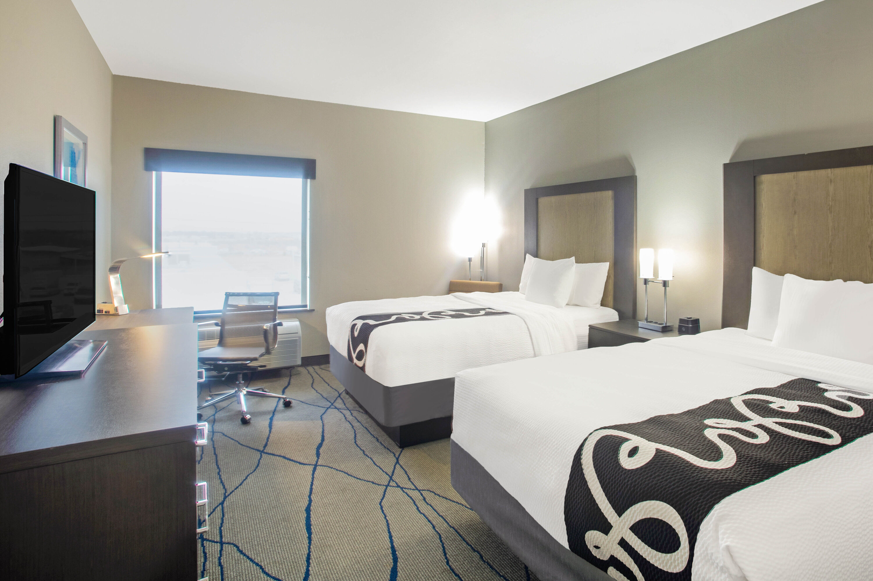 Guest room at the La Quinta Inn & Suites by Wyndham Ponca City in Ponca City, Oklahoma