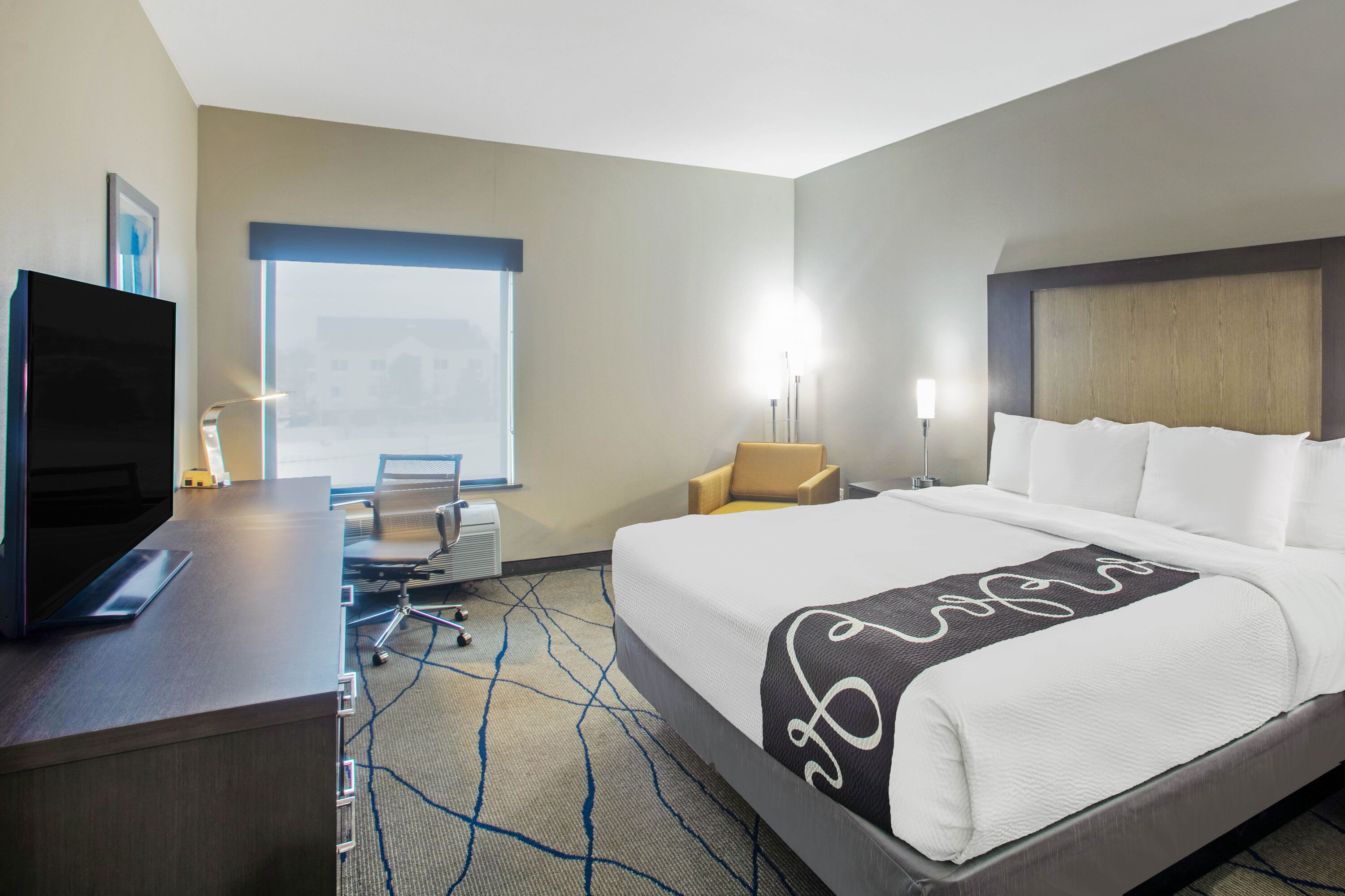 Guest room at the La Quinta Inn & Suites by Wyndham Ponca City in Ponca City, Oklahoma
