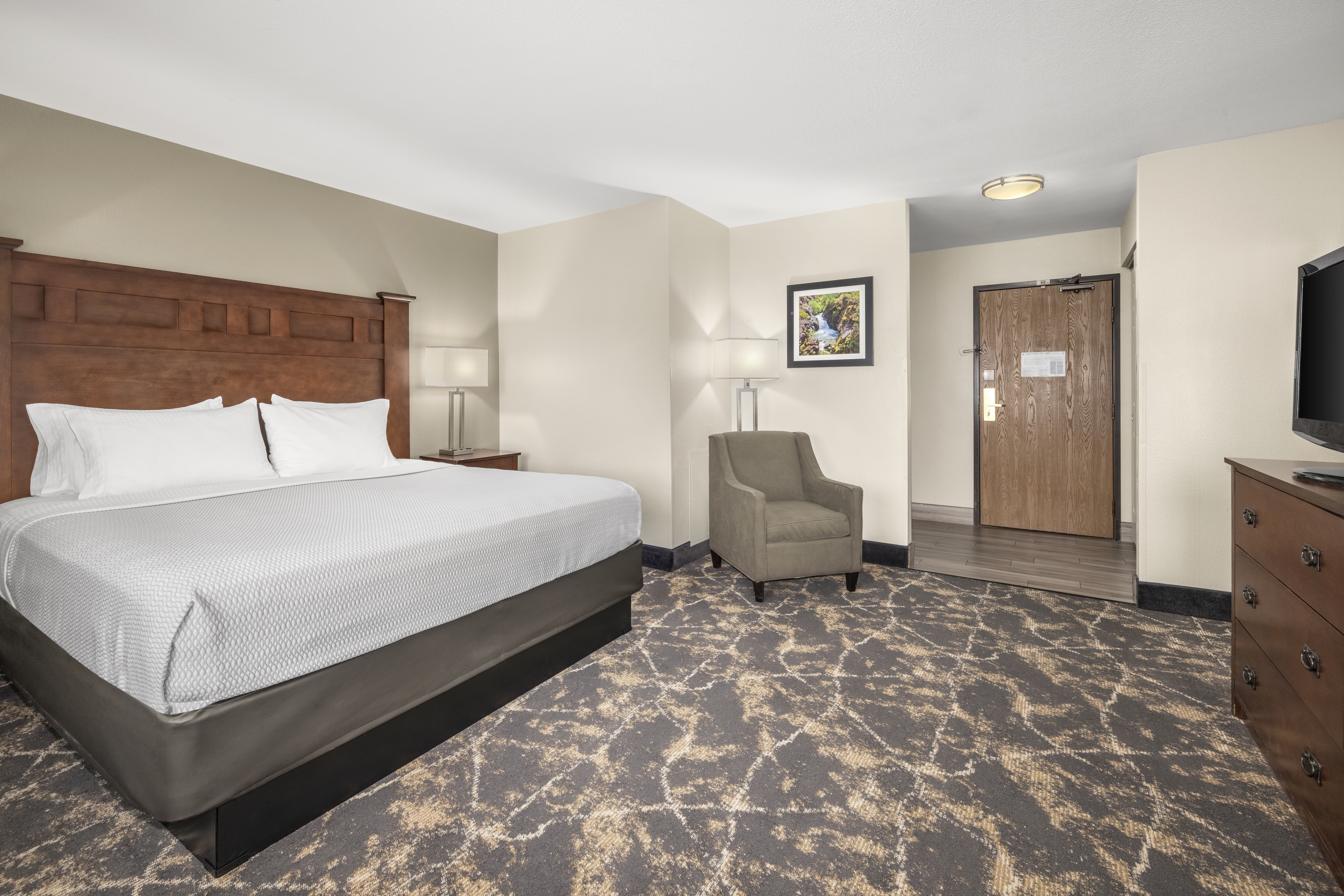 Guest room at the La Quinta Inn & Suites by Wyndham Grants Pass in Grants Pass, Oregon