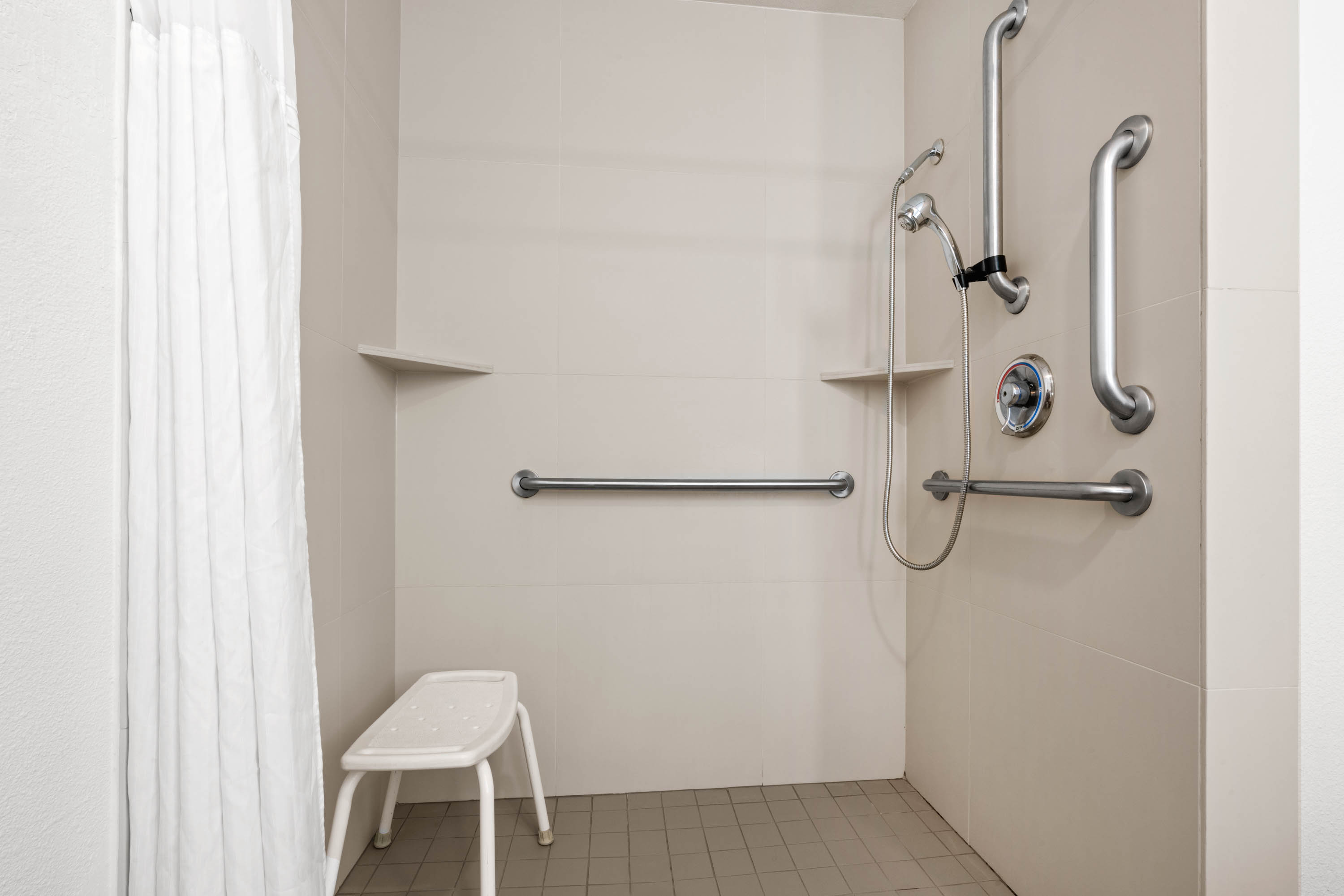 Guest room bath at the La Quinta Inn & Suites by Wyndham Portland NW in Portland, Oregon