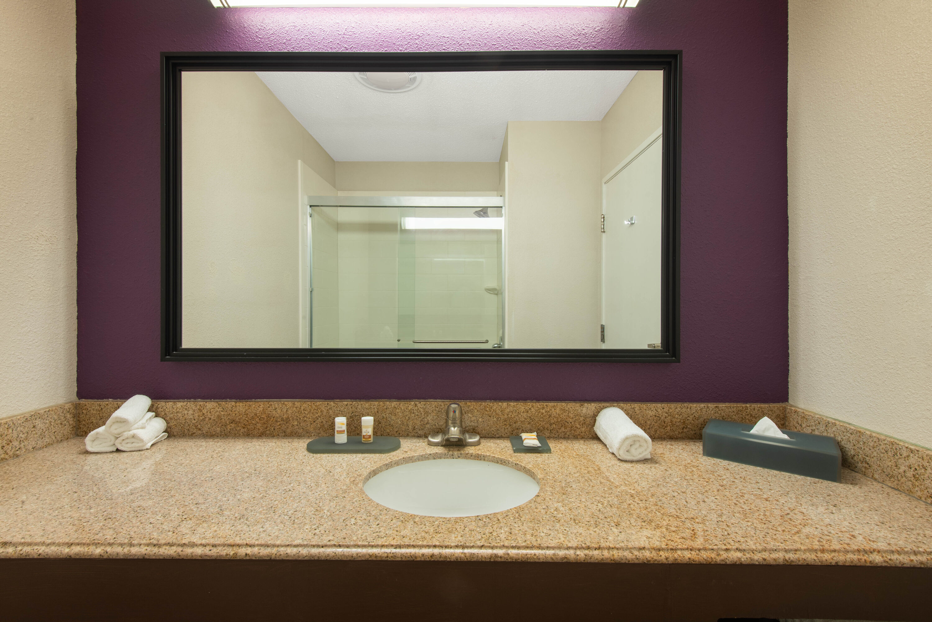 Guest room bath at the La Quinta Inn & Suites by Wyndham Erie in Erie, Pennsylvania