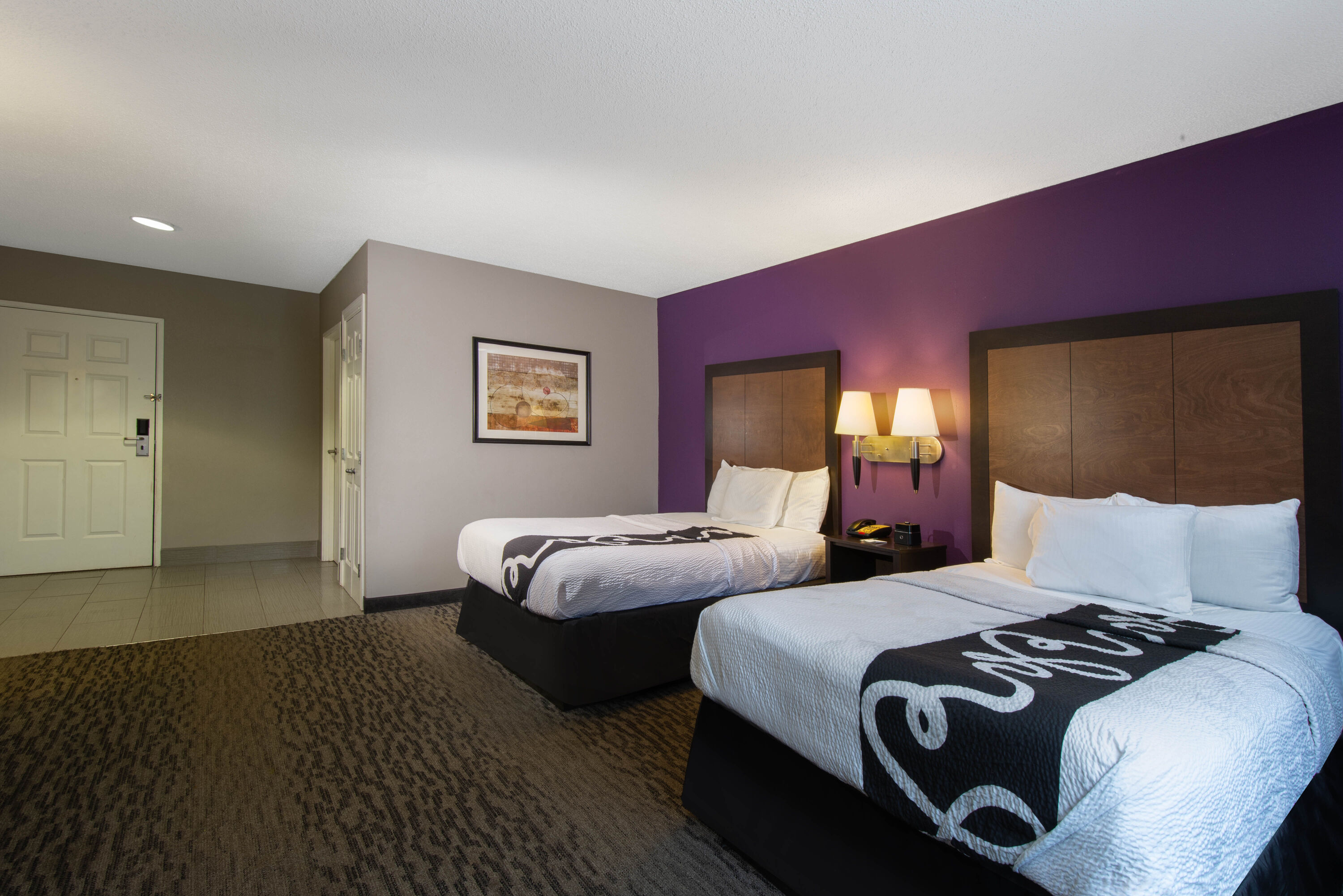 Guest room at the La Quinta Inn & Suites by Wyndham Erie in Erie, Pennsylvania