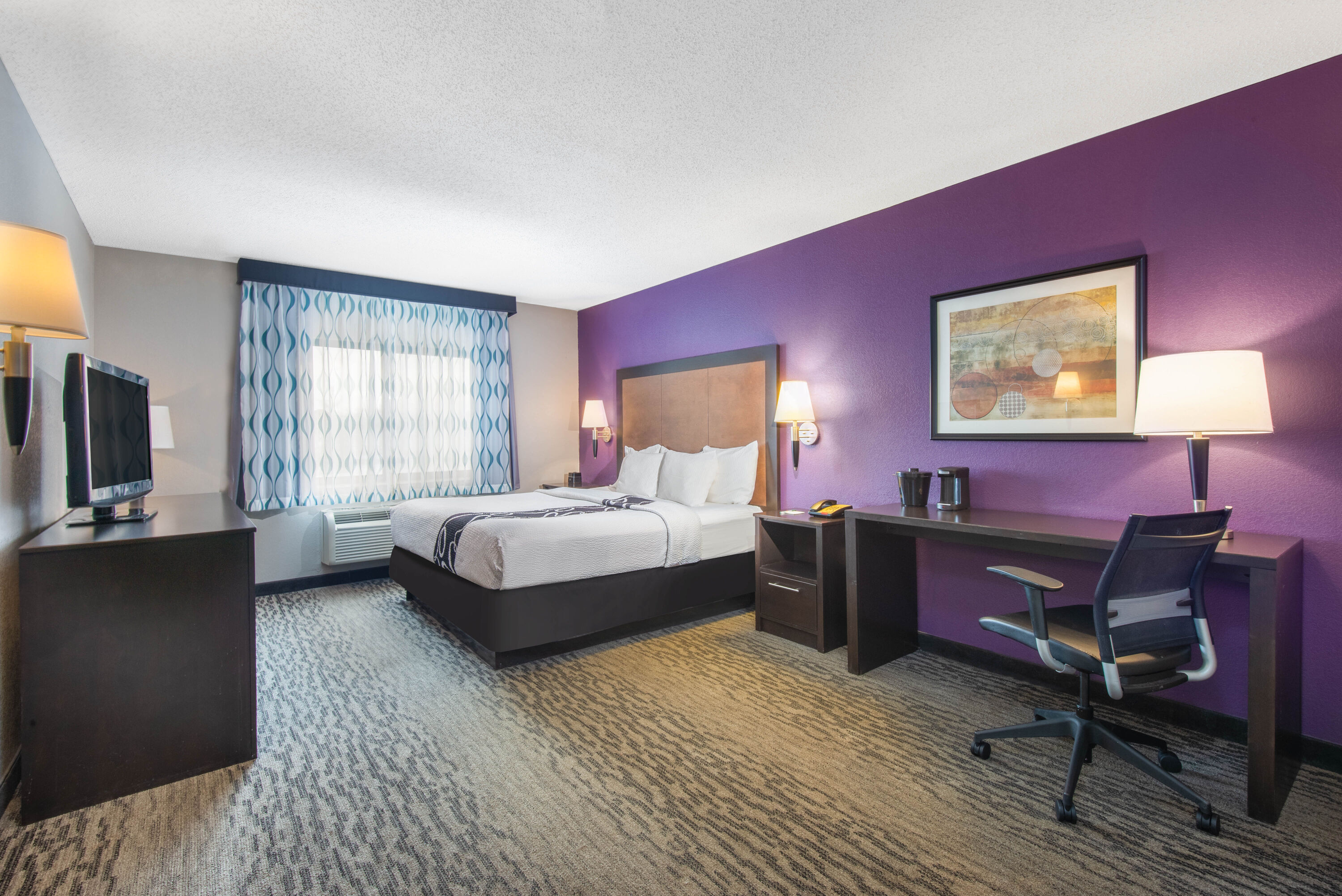 Guest room at the La Quinta Inn & Suites by Wyndham Erie in Erie, Pennsylvania
