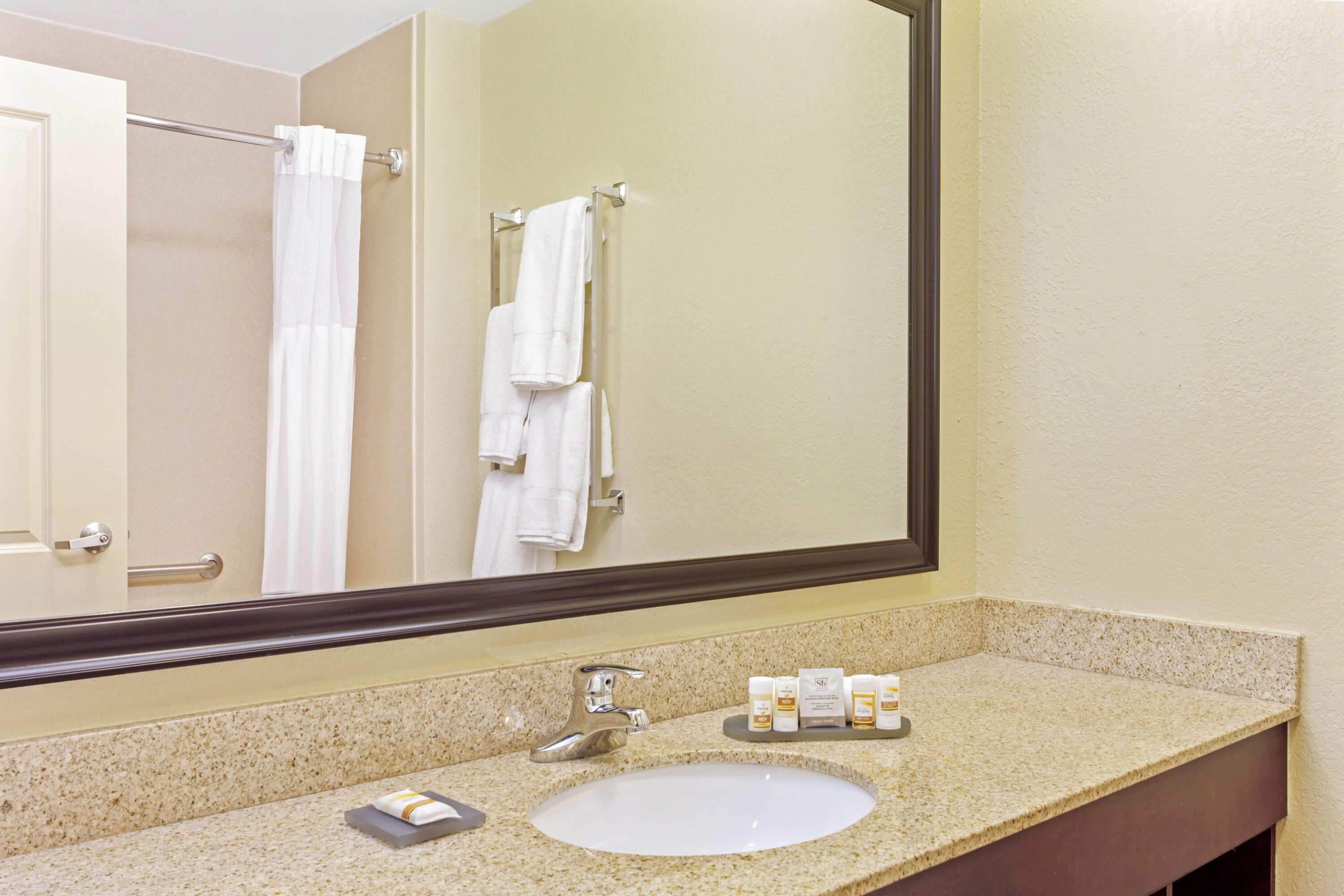 Guest room bath at the La Quinta Inn & Suites by Wyndham Lancaster in Ronks, Pennsylvania