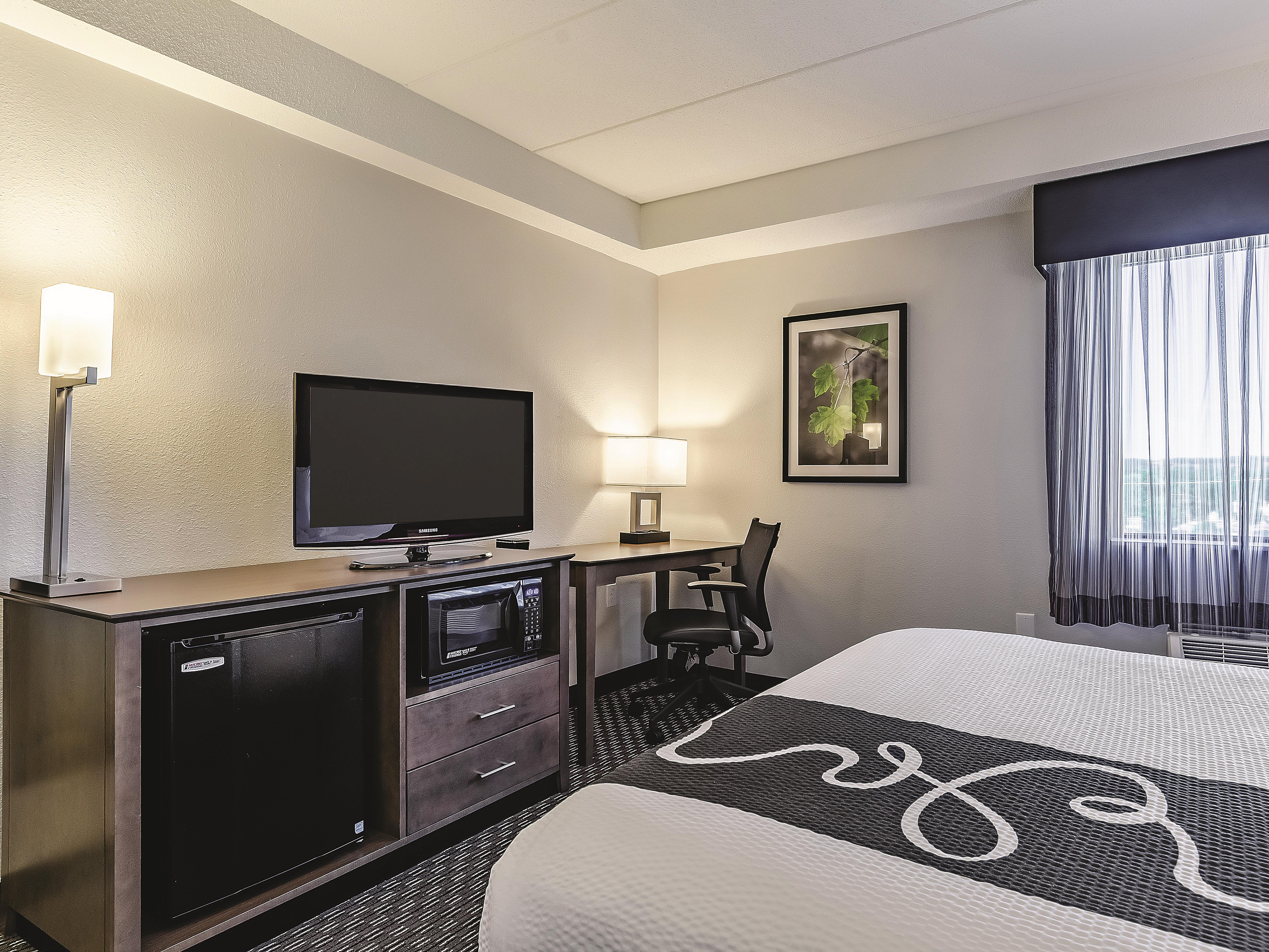 Guest room at the La Quinta Inn & Suites by Wyndham Warwick Providence Airport in Warwick, Rhode Island