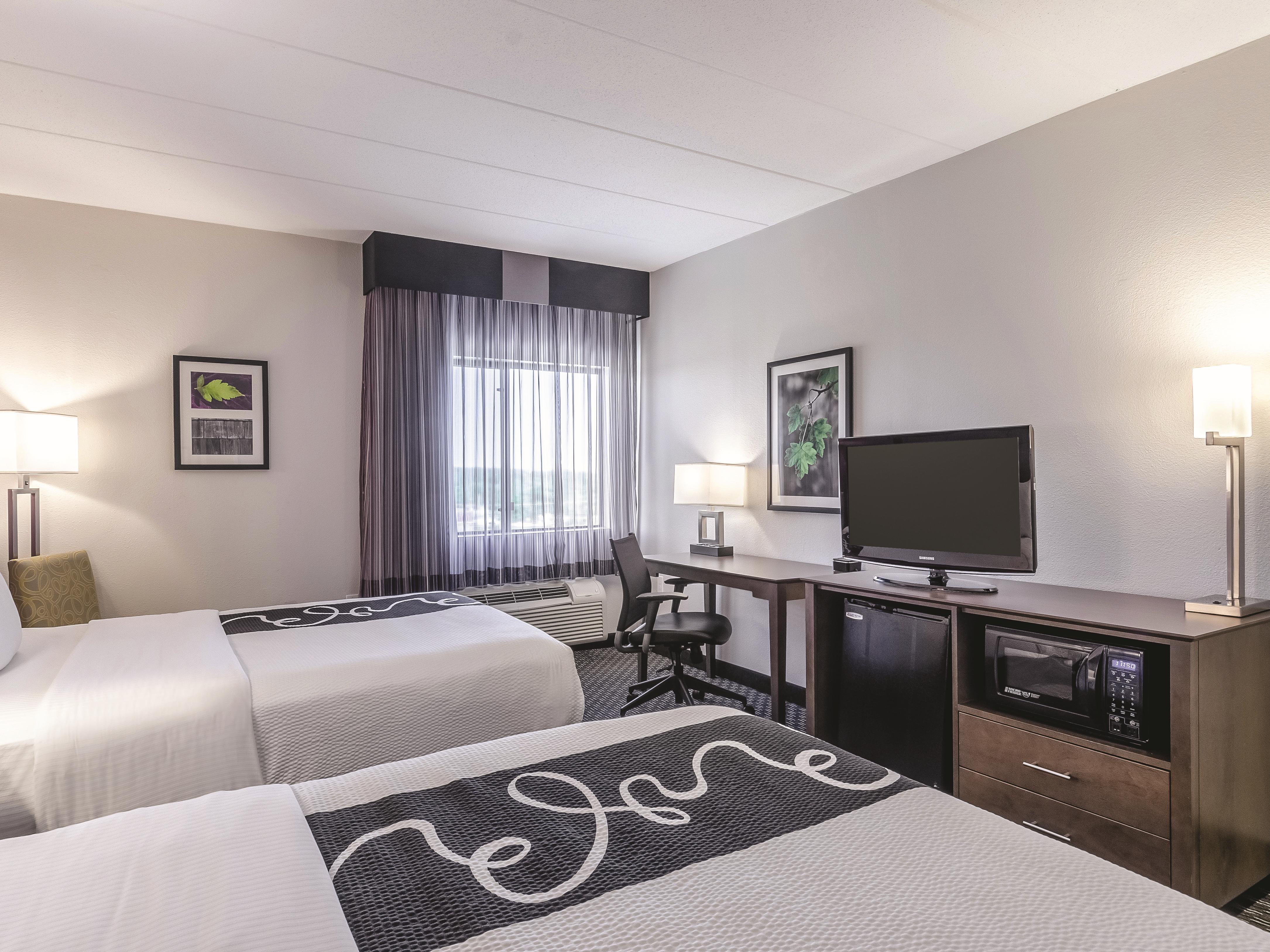 Guest room at the La Quinta Inn & Suites by Wyndham Warwick Providence Airport in Warwick, Rhode Island