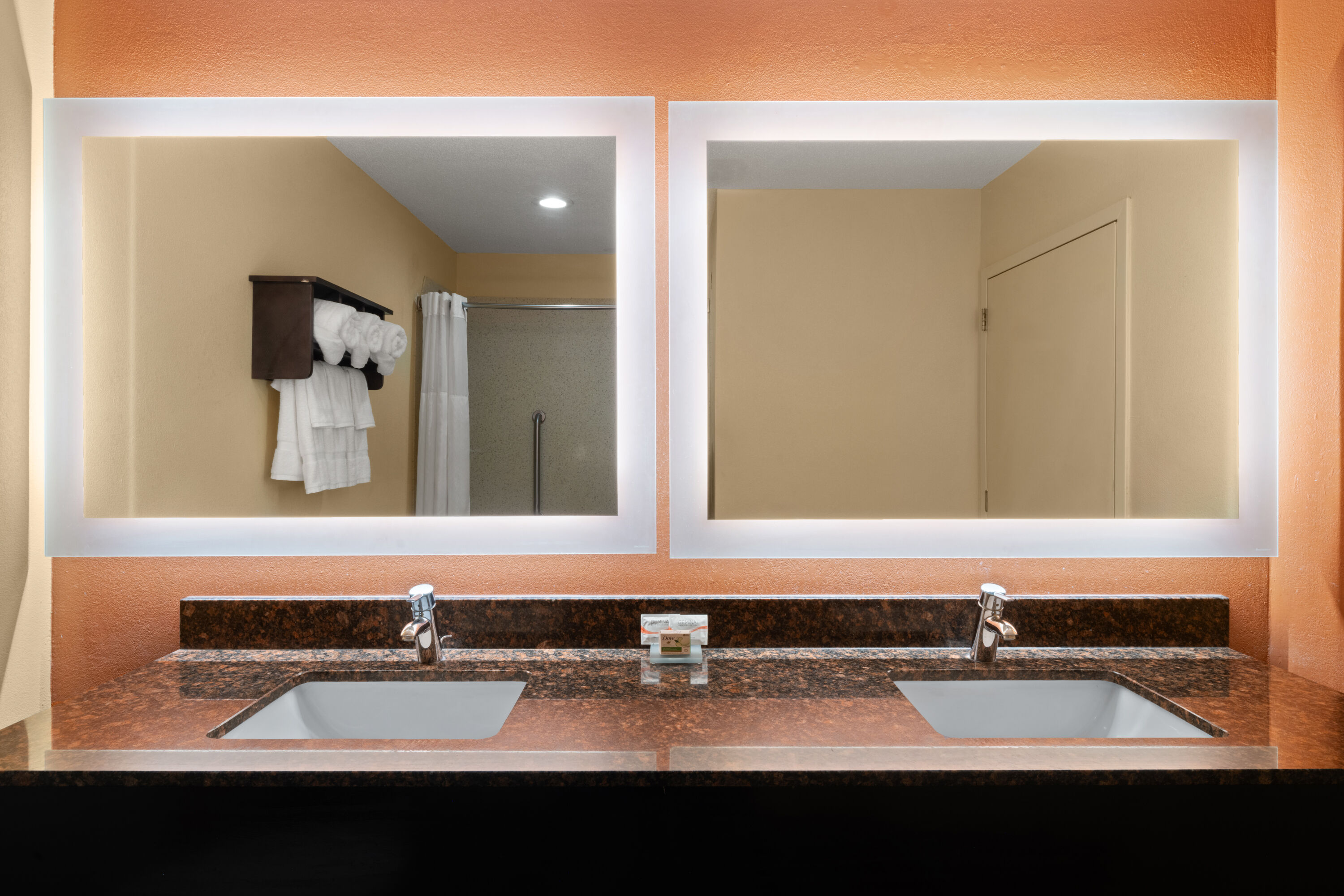 Guest room bath at the La Quinta Inn & Suites by Wyndham Florence in Florence, South Carolina