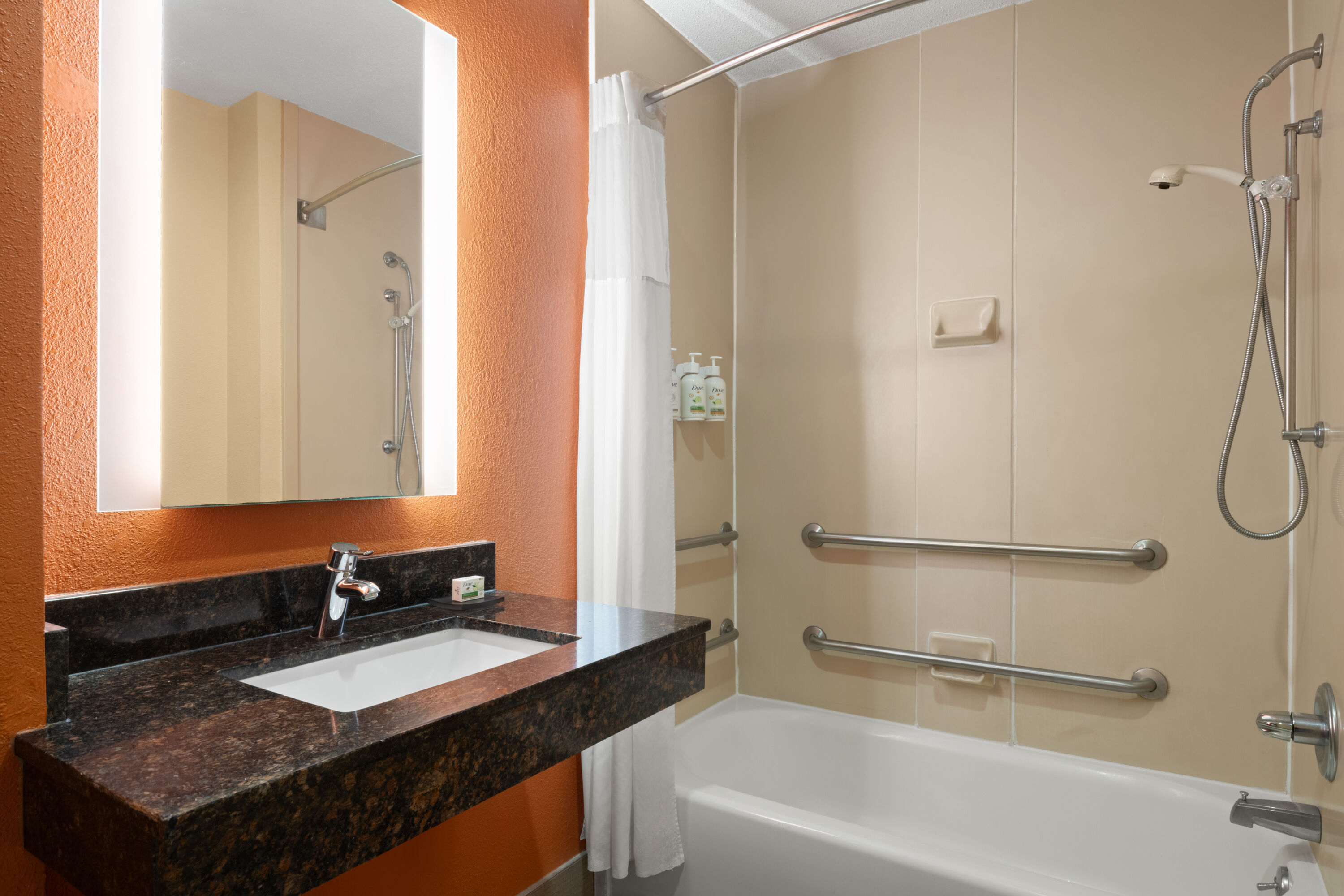 Guest room bath at the La Quinta Inn & Suites by Wyndham Florence in Florence, South Carolina