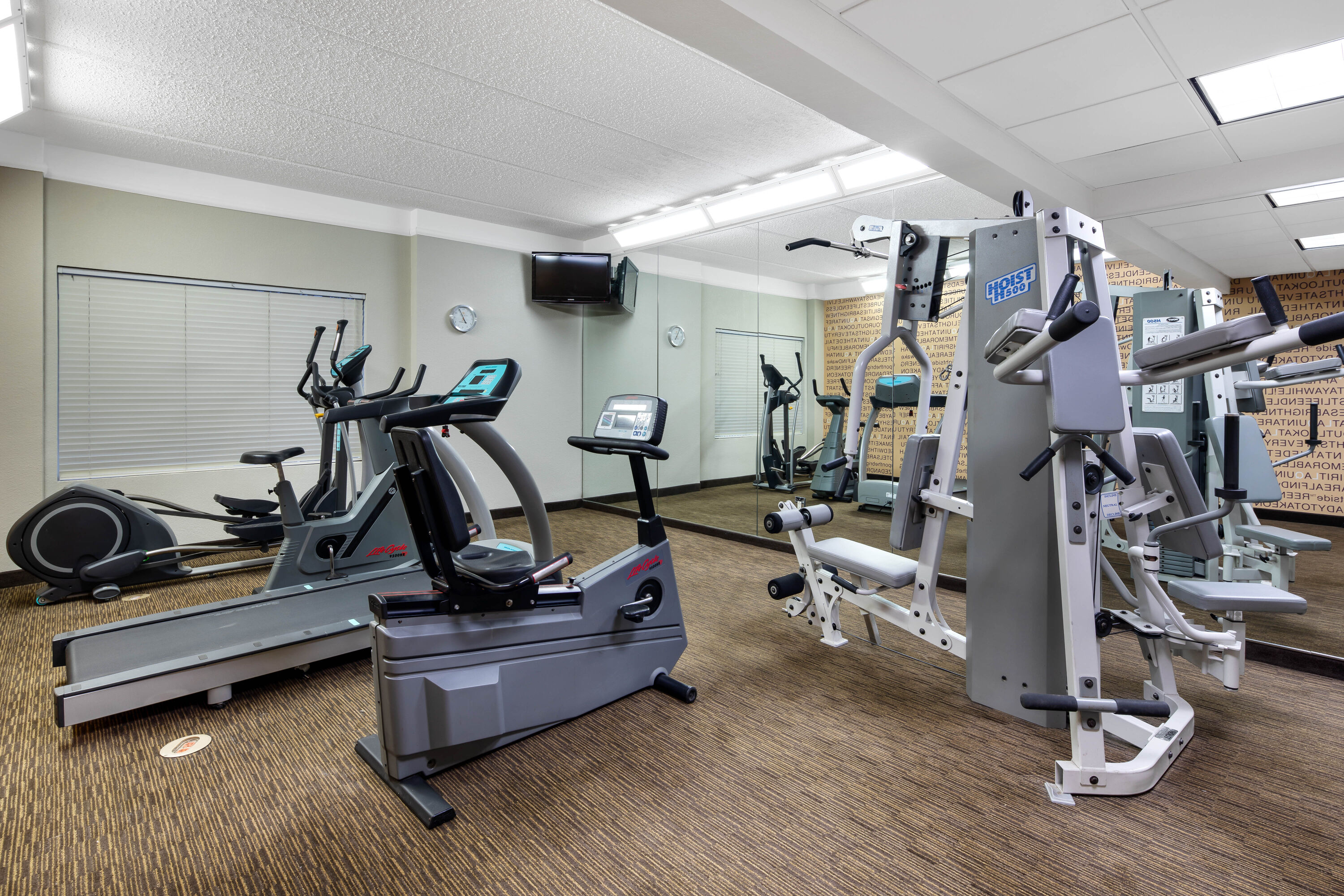 Fitness room at La Quinta Inn & Suites by Wyndham Greenville Haywood in Greenville, South Carolina