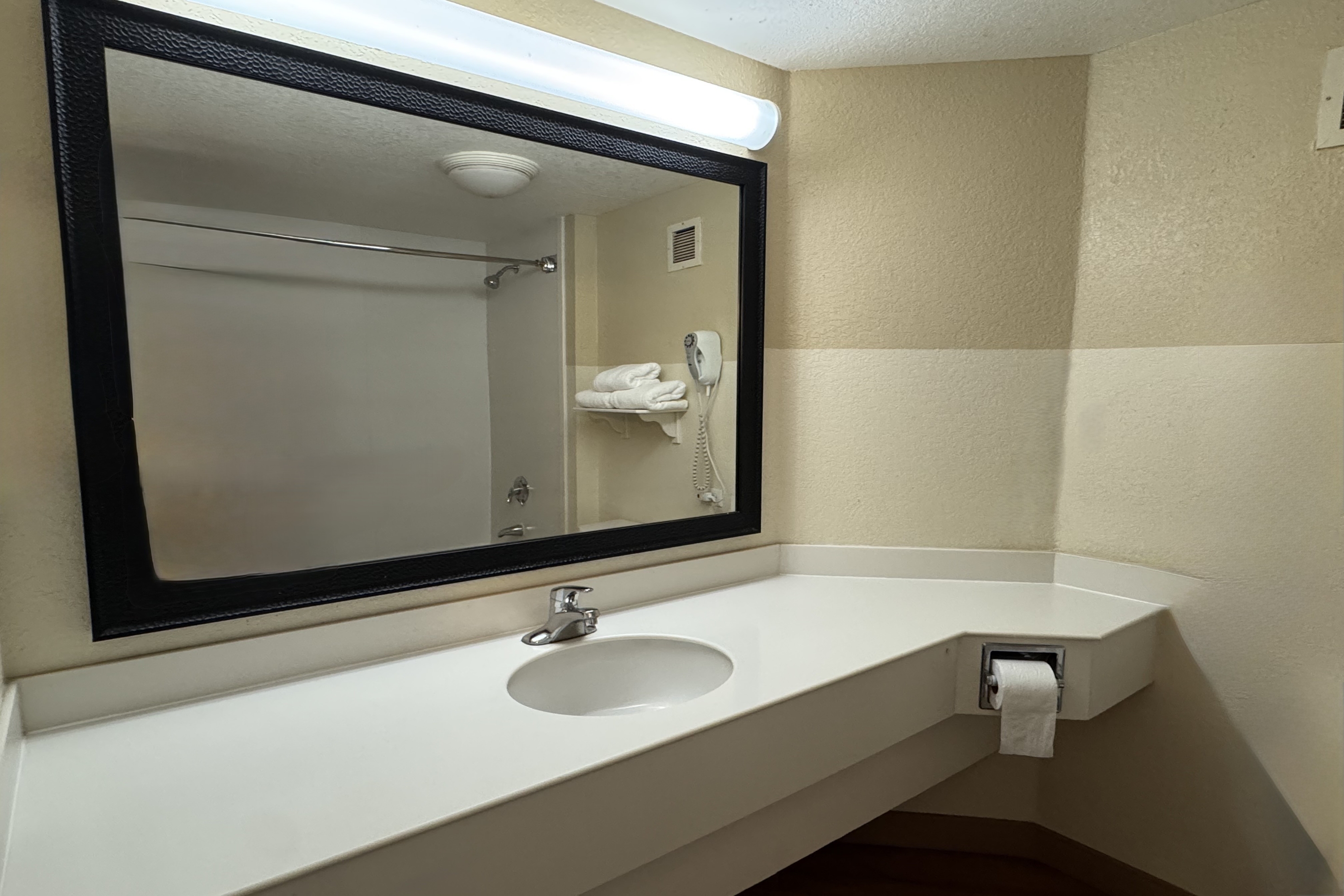 Guest room bath at the La Quinta by Wyndham Haywood Mall-Near Greenville Downtown in Greenville, South Carolina