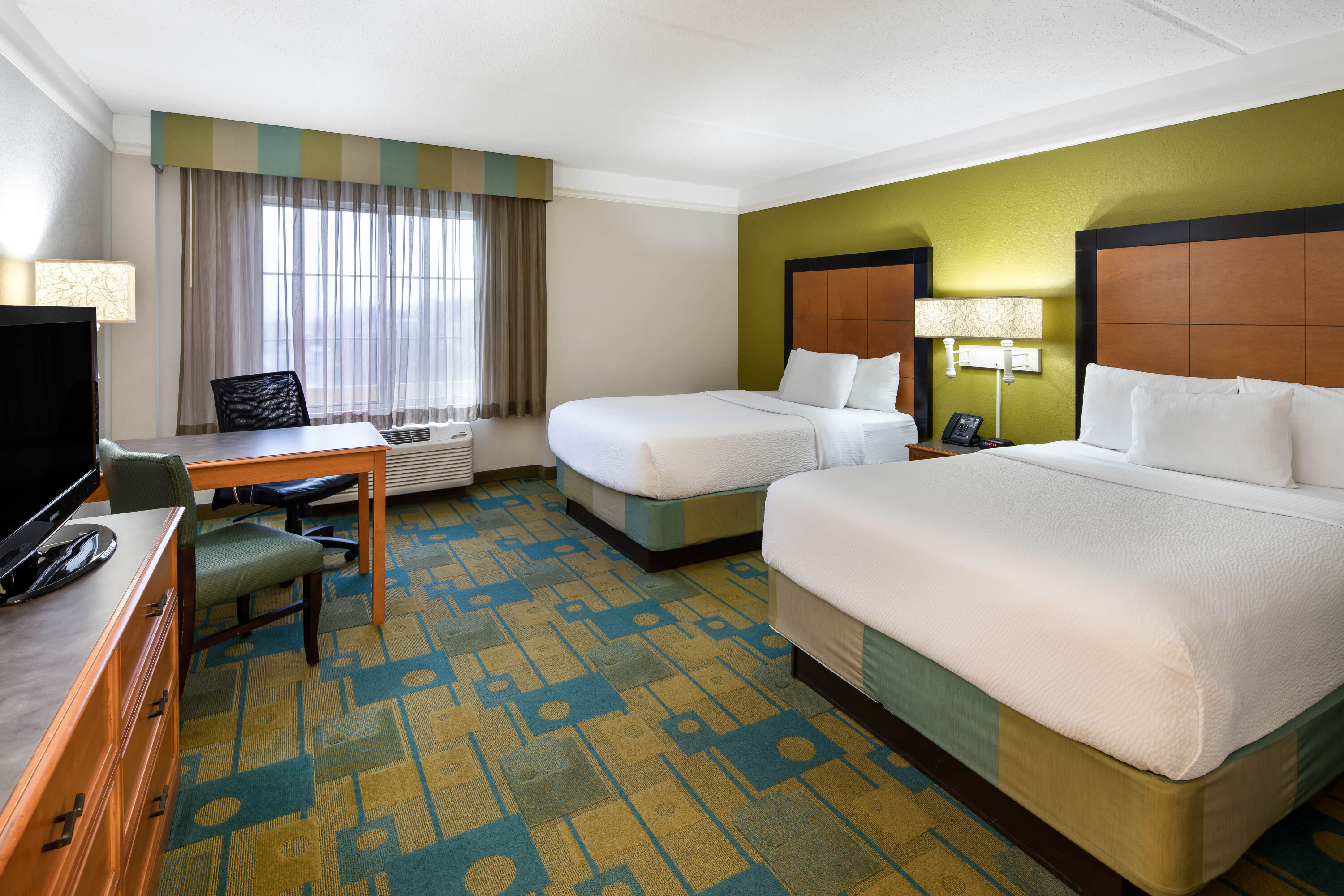 Guest room at the La Quinta Inn & Suites by Wyndham Greenville Haywood in Greenville, South Carolina