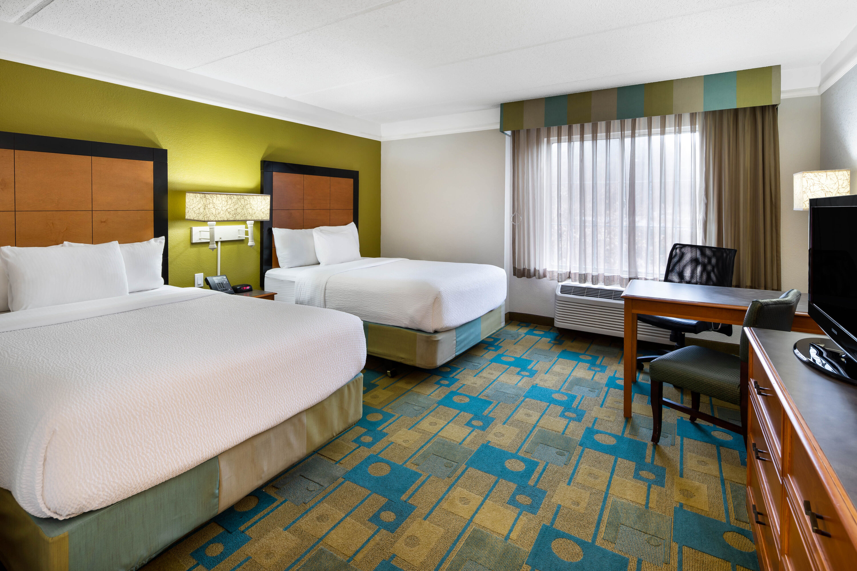 Guest room at the La Quinta Inn & Suites by Wyndham Greenville Haywood in Greenville, South Carolina
