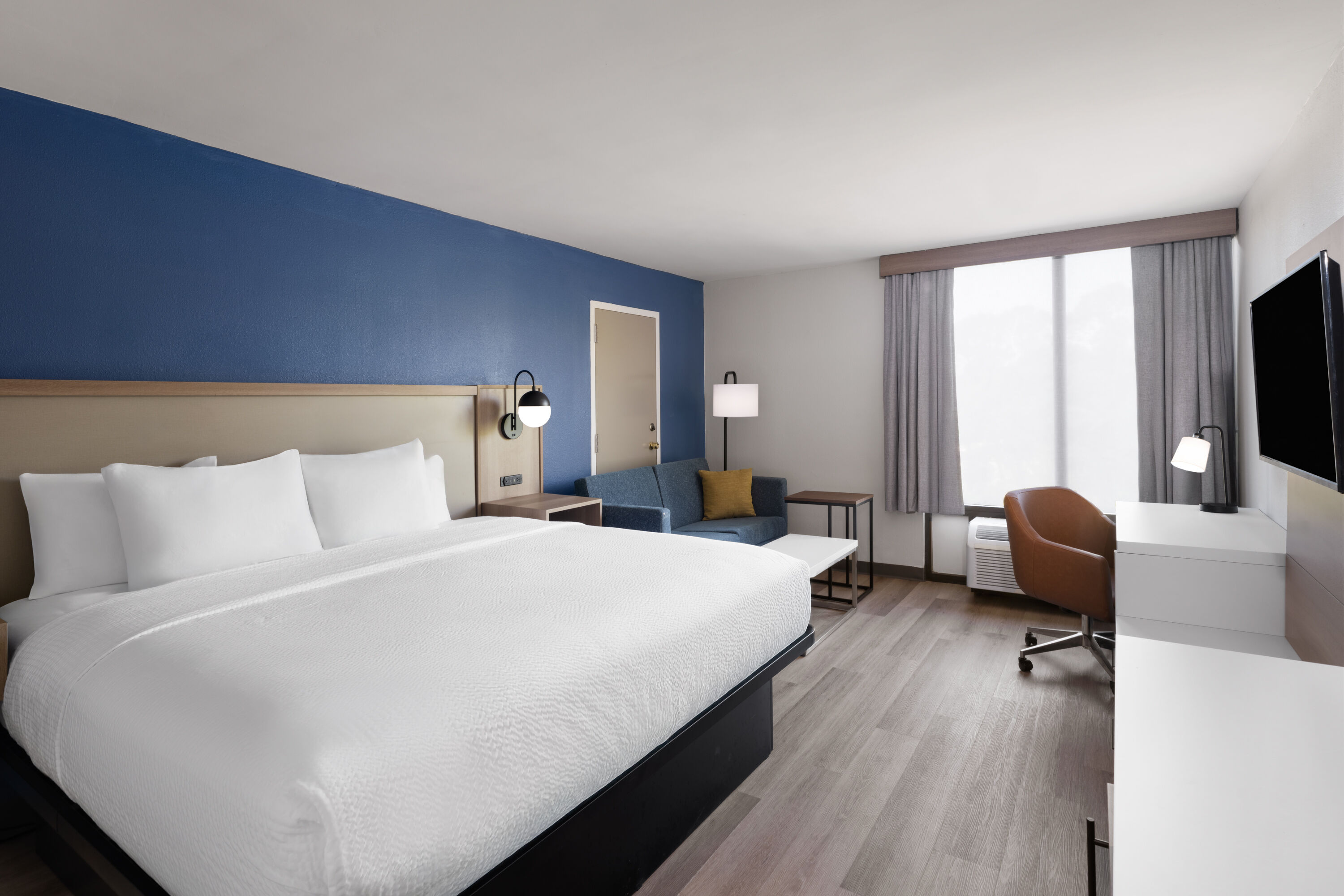 Guest room at the La Quinta Inn & Suites by Wyndham Myrtle Beach in Myrtle Beach, South Carolina