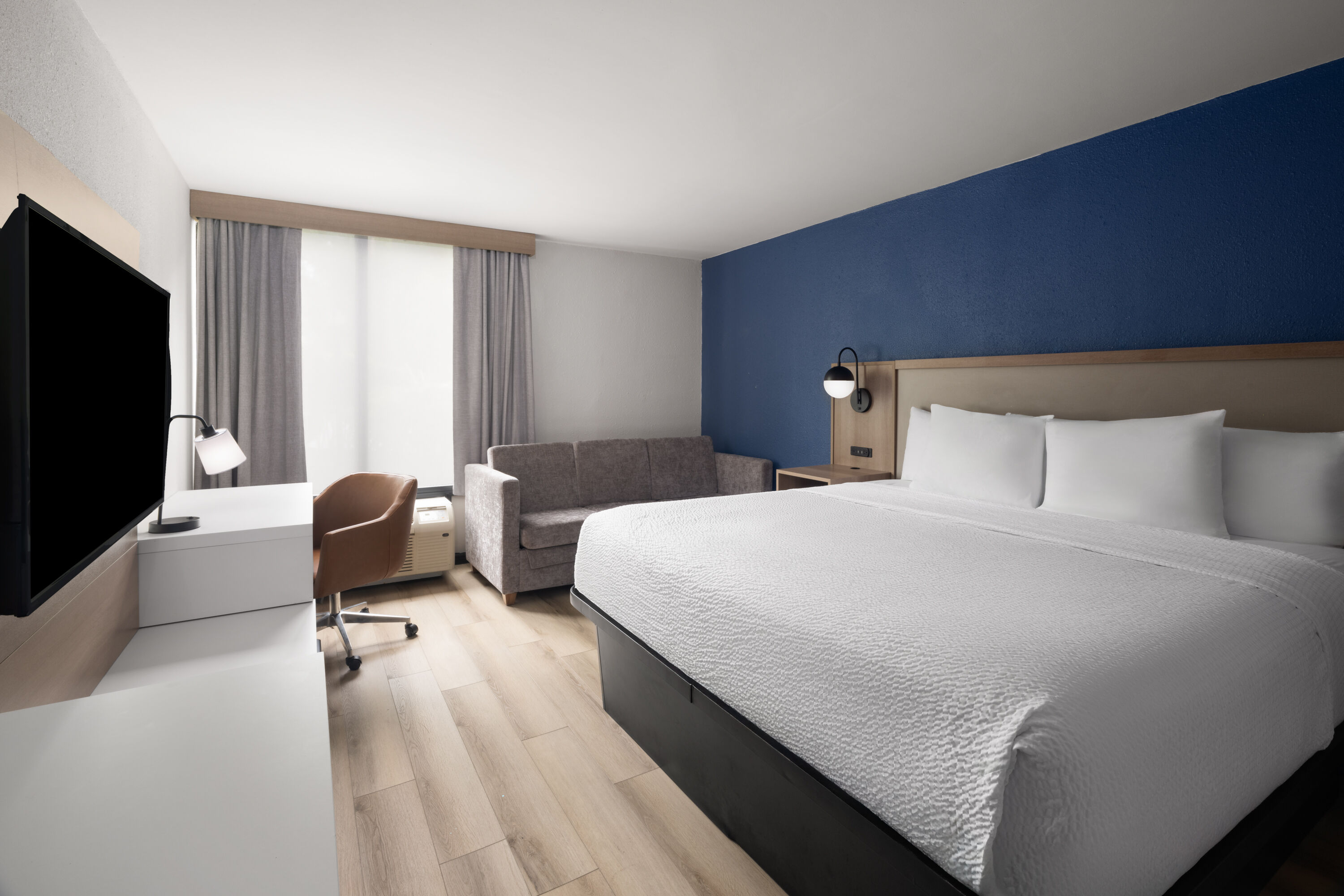 Guest room at the La Quinta Inn & Suites by Wyndham Myrtle Beach in Myrtle Beach, South Carolina