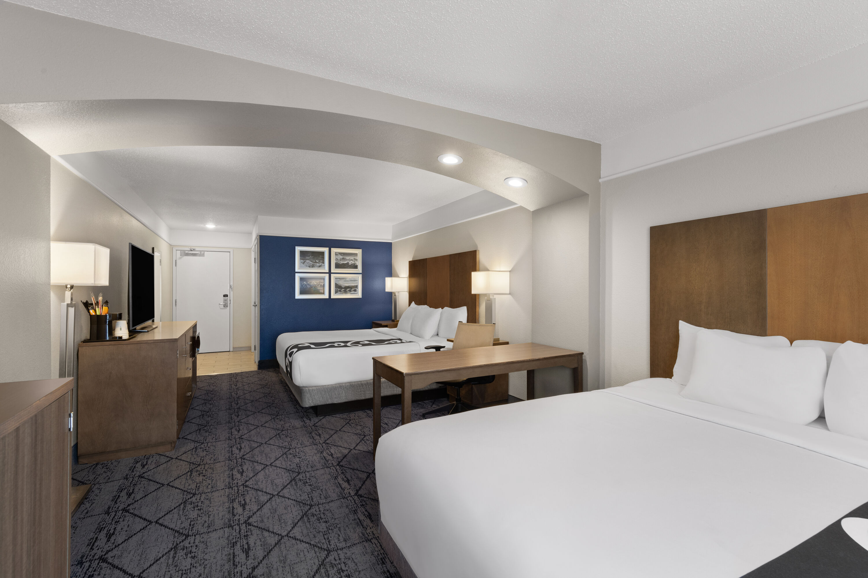 Guest room at the La Quinta Inn and Suites by Wyndham at WaTiki Waterpark in Rapid City, South Dakota