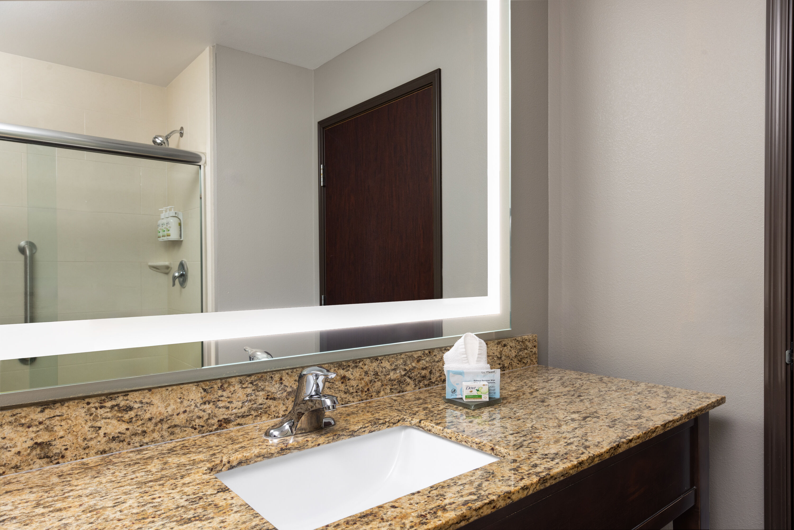 Guest room bath at the La Quinta Inn & Suites by Wyndham Sioux Falls in Sioux Falls, South Dakota