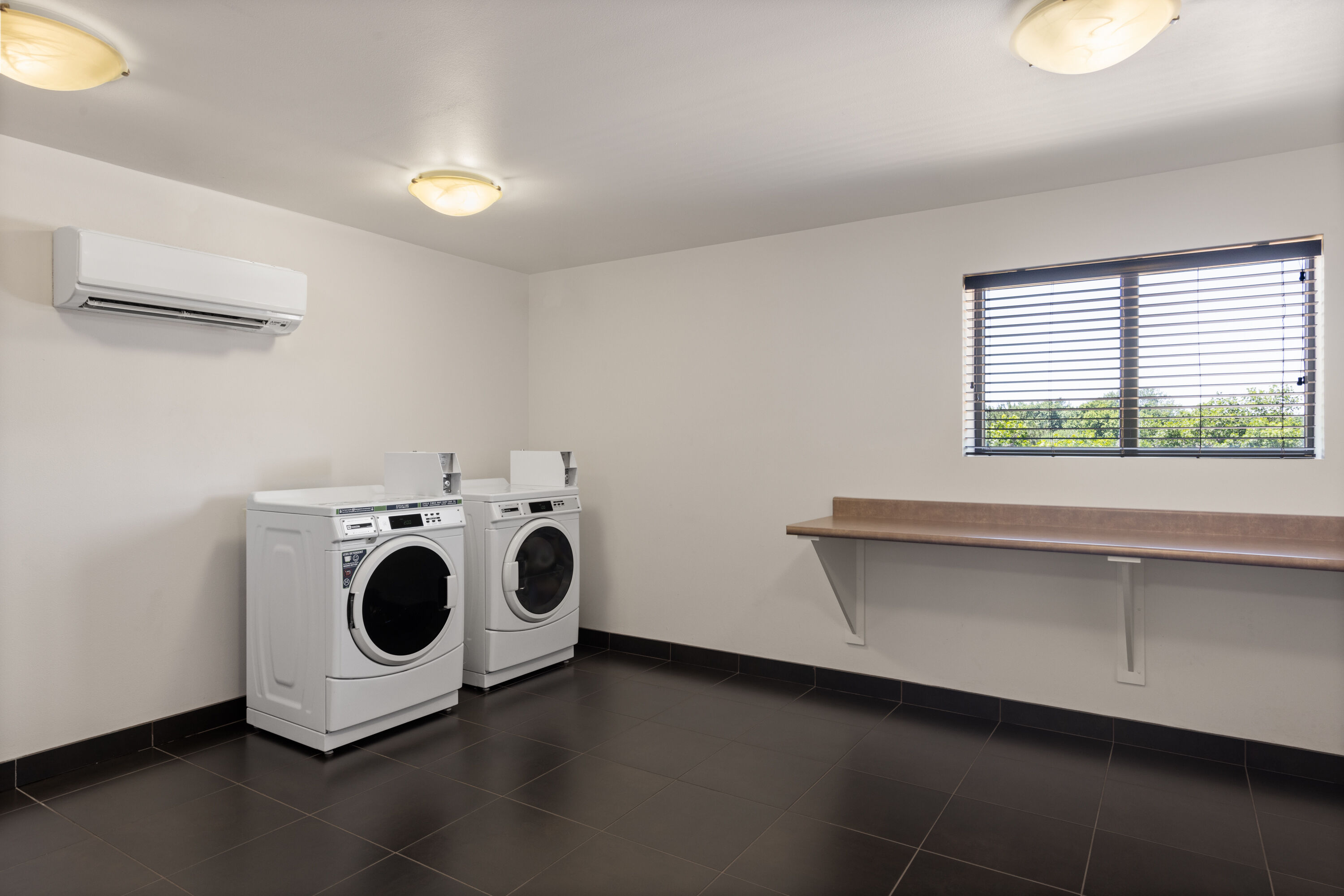 Laundry facilities at La Quinta Inn & Suites by Wyndham Sioux Falls in Sioux Falls, South Dakota