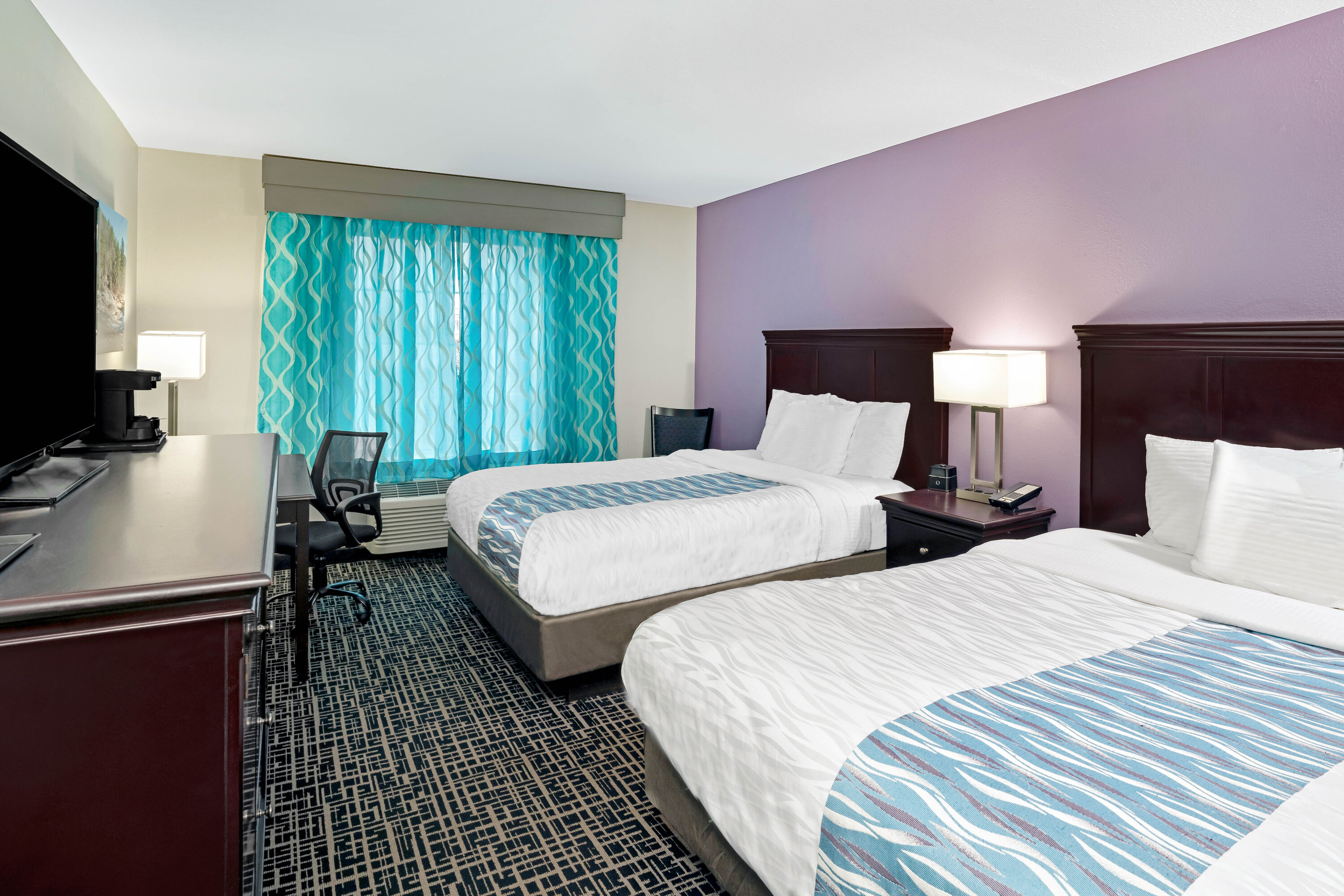 Guest room at the La Quinta Inn & Suites by Wyndham Cookeville in Cookeville, Tennessee