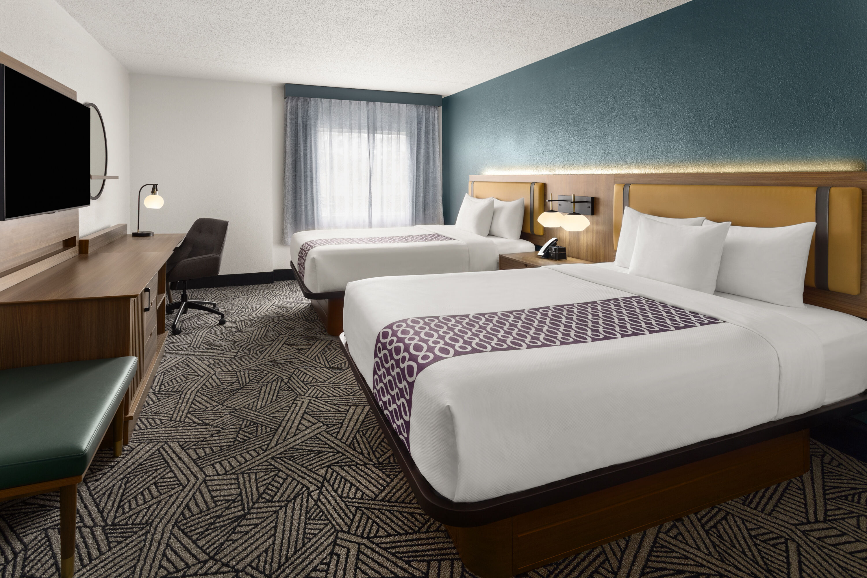 Guest room at the La Quinta Inn & Suites by Wyndham Chattanooga - East Ridge in East Ridge, Tennessee