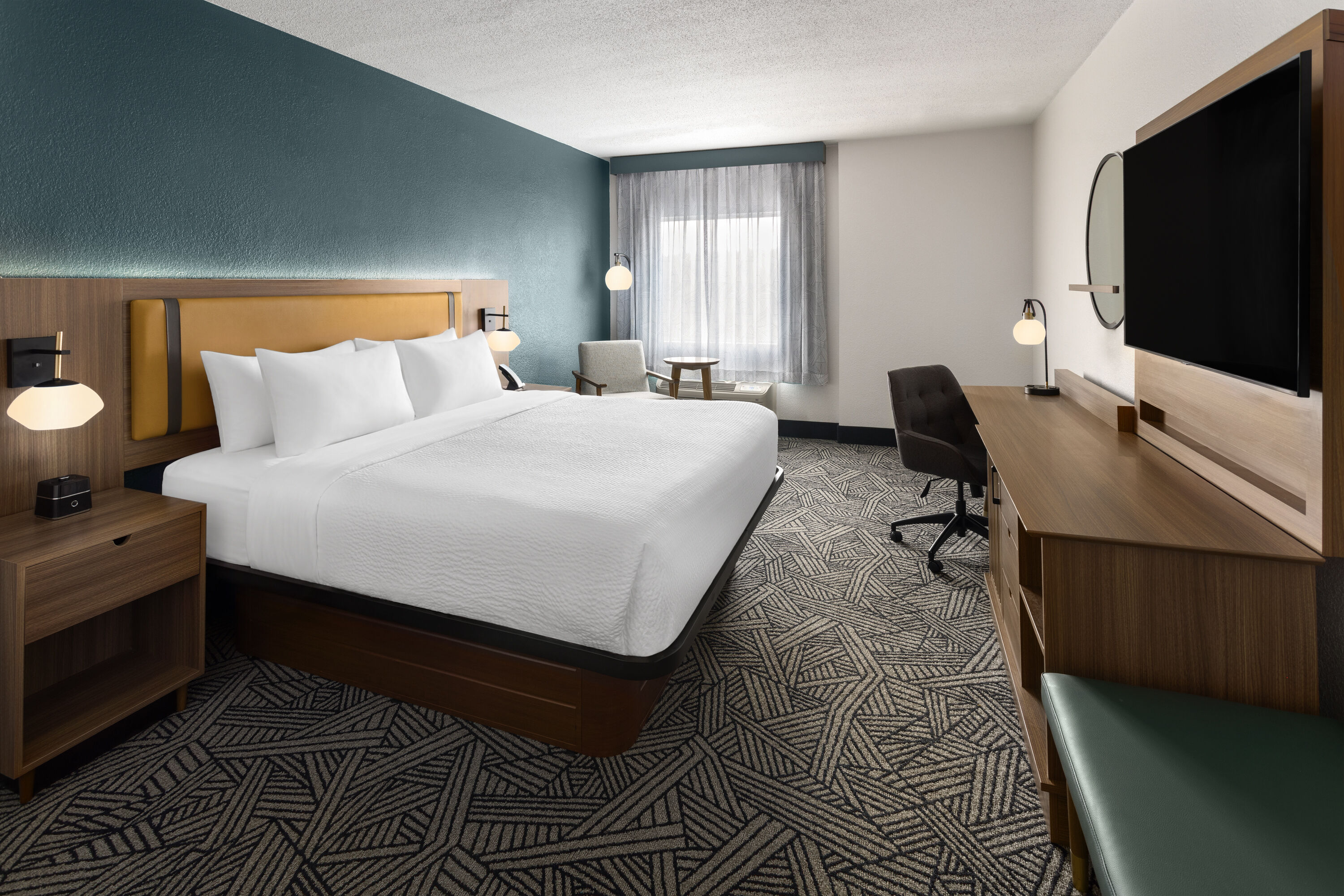 Guest room at the La Quinta Inn & Suites by Wyndham Chattanooga - East Ridge in East Ridge, Tennessee