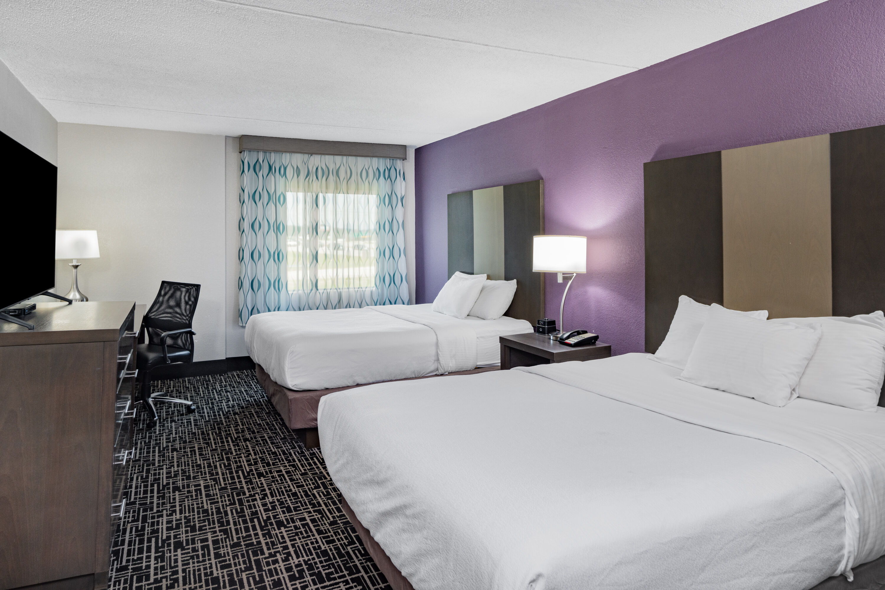 Guest room at the La Quinta Inn & Suites by Wyndham Chattanooga - East Ridge in East Ridge, Tennessee