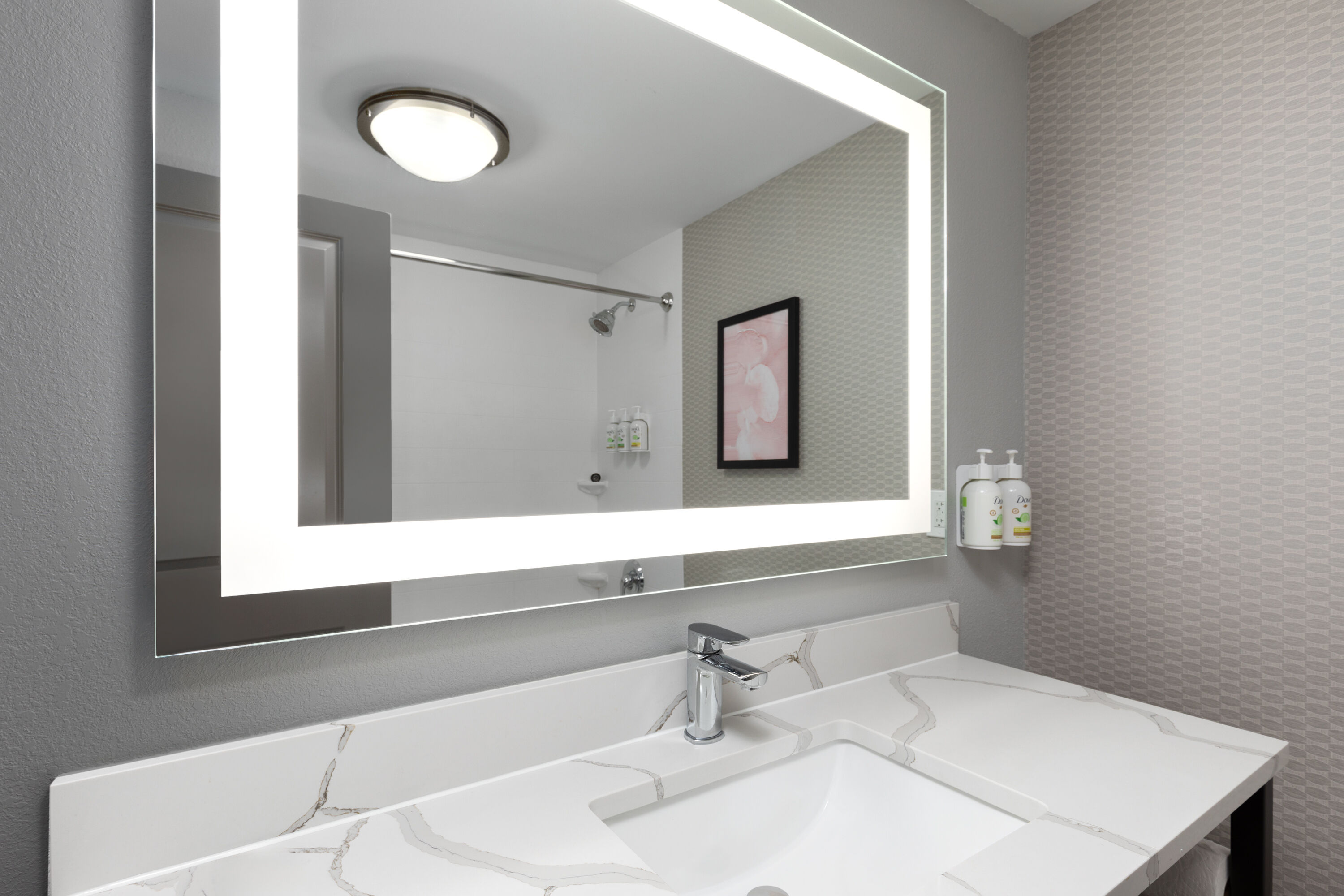 Guest room bath at the La Quinta Inn & Suites by Wyndham Knoxville Papermill in Knoxville, Tennessee