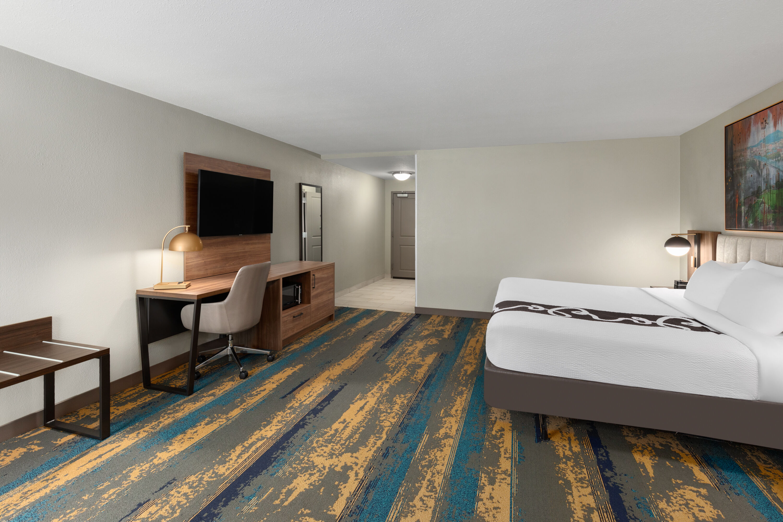 Guest room at the La Quinta Inn & Suites by Wyndham Knoxville Papermill in Knoxville, Tennessee