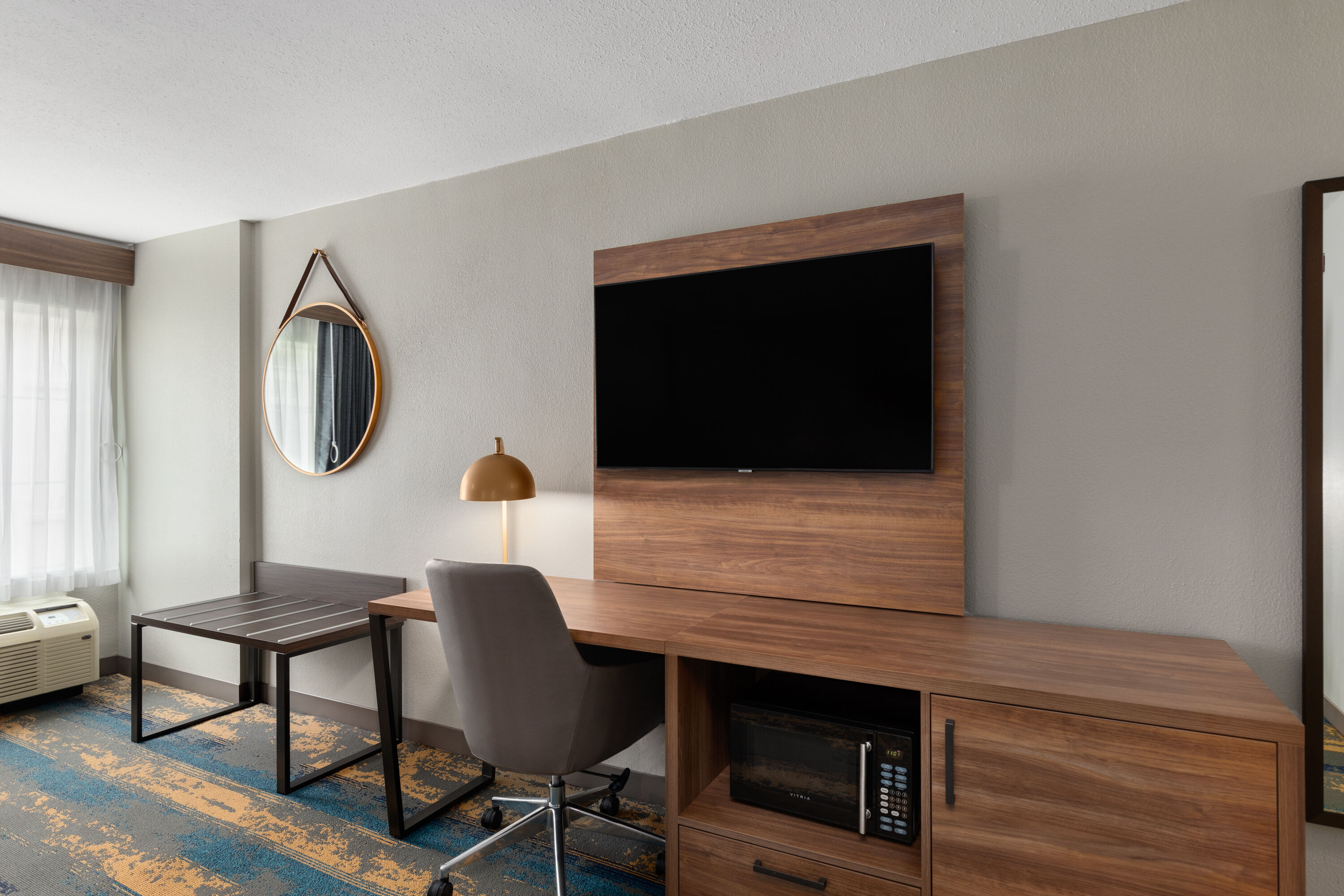 Guest room at the La Quinta Inn & Suites by Wyndham Knoxville Papermill in Knoxville, Tennessee