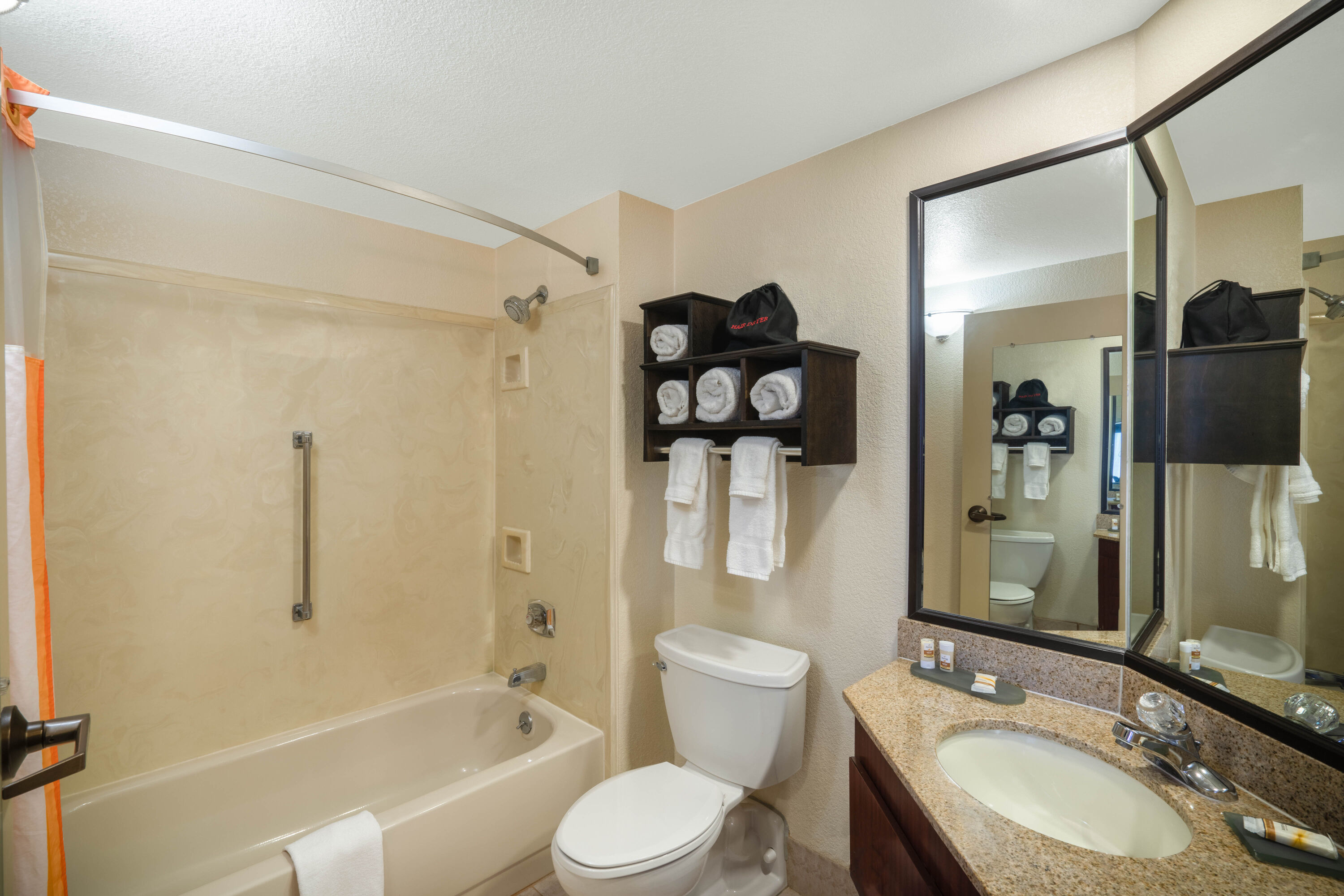 Guest room bath at the La Quinta Inn & Suites by Wyndham Memphis Airport Graceland in Memphis, Tennessee