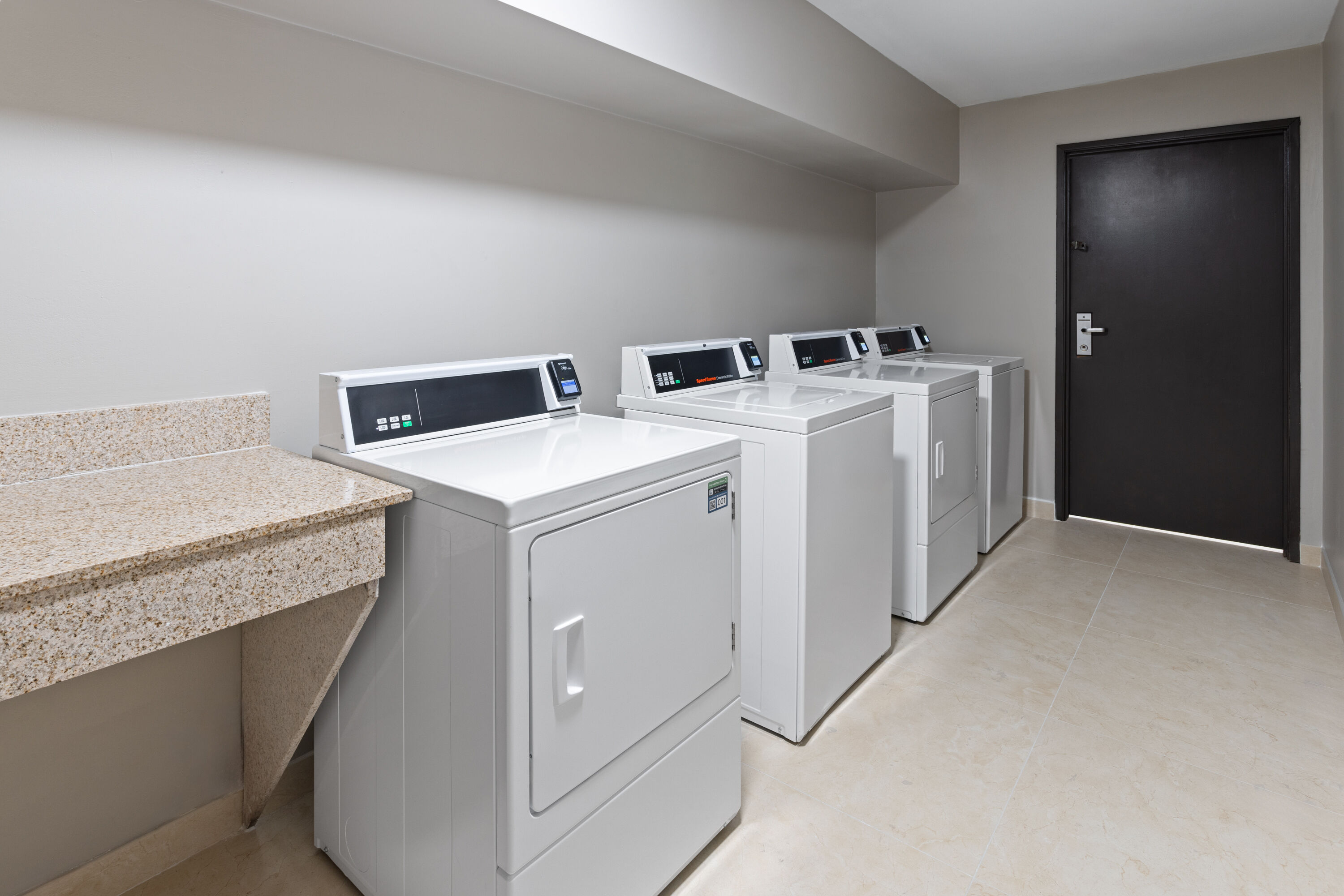 Laundry facilities at La Quinta Inn & Suites by Wyndham Memphis I-240 in Memphis, Tennessee