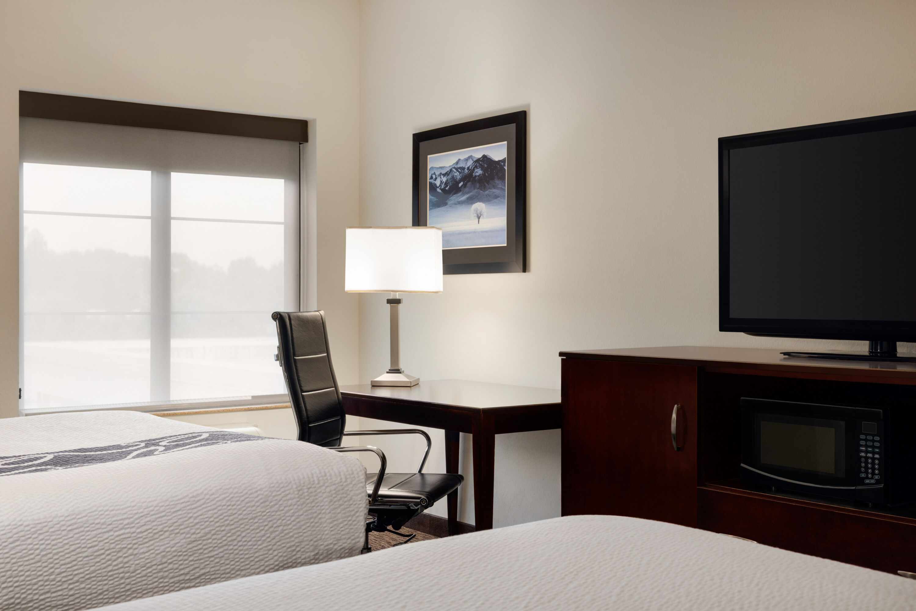 Guest room at the La Quinta Inn & Suites by Wyndham Memphis Wolfchase in Memphis, Tennessee