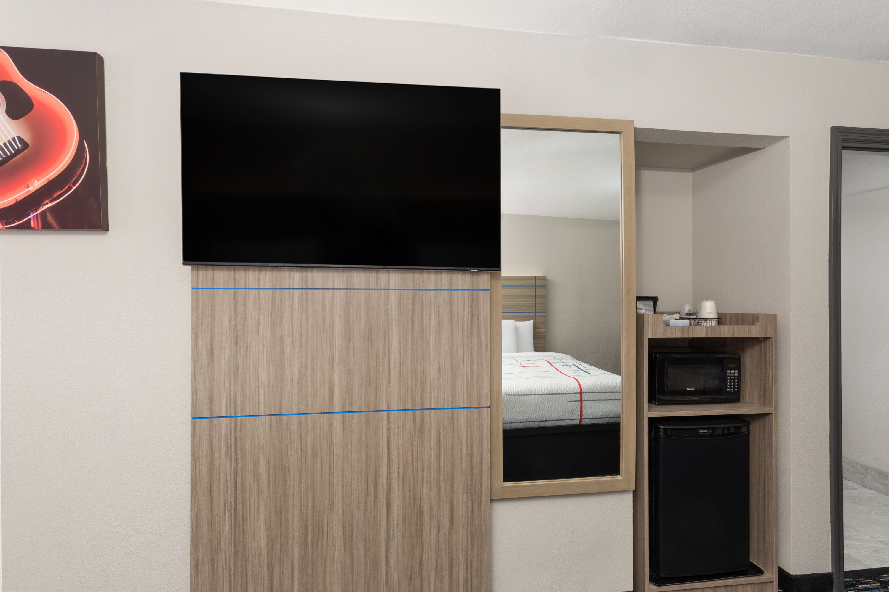 Guest room at the La Quinta Inn by Wyndham Nashville South in Nashville, Tennessee