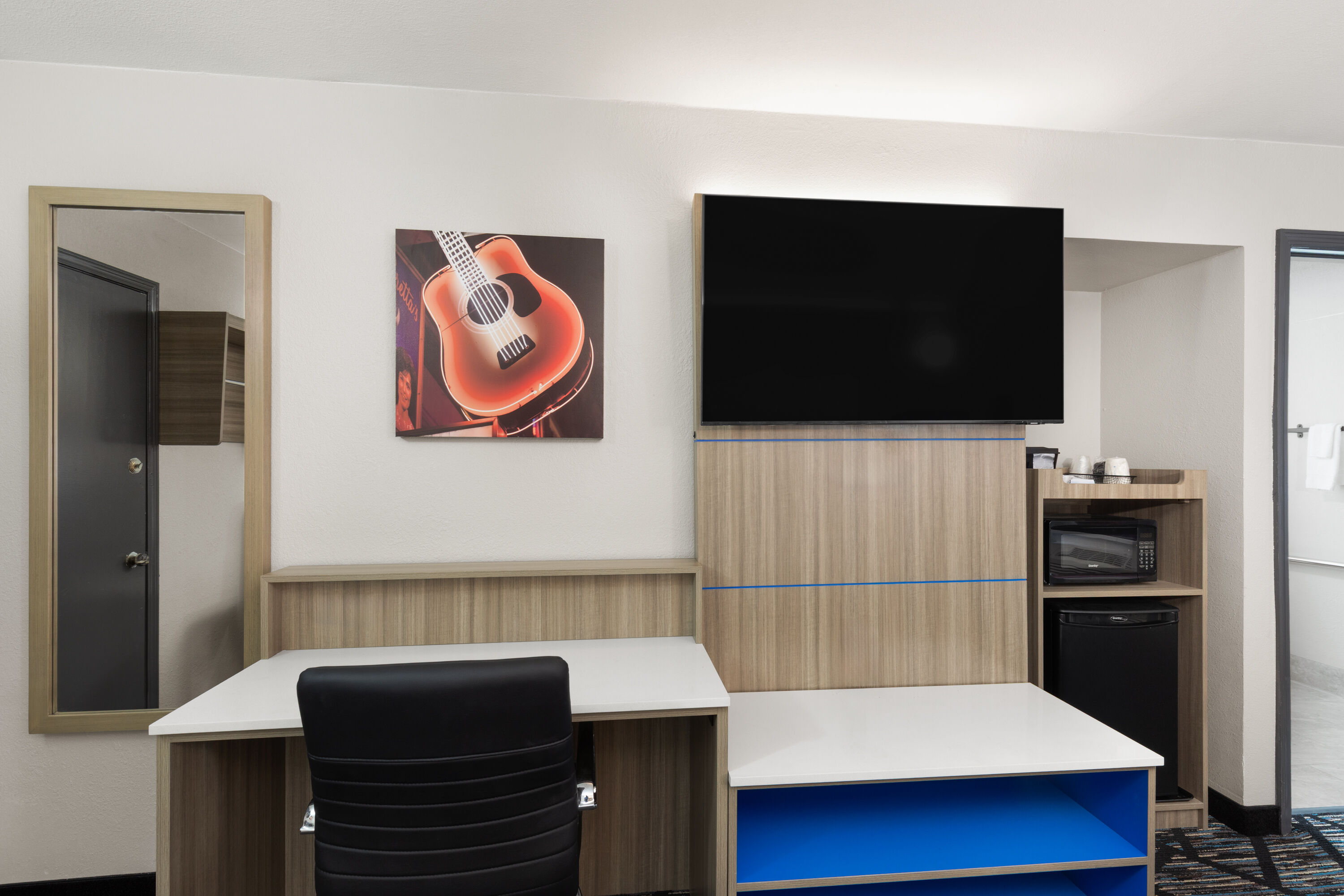 Guest room at the La Quinta Inn by Wyndham Nashville South in Nashville, Tennessee