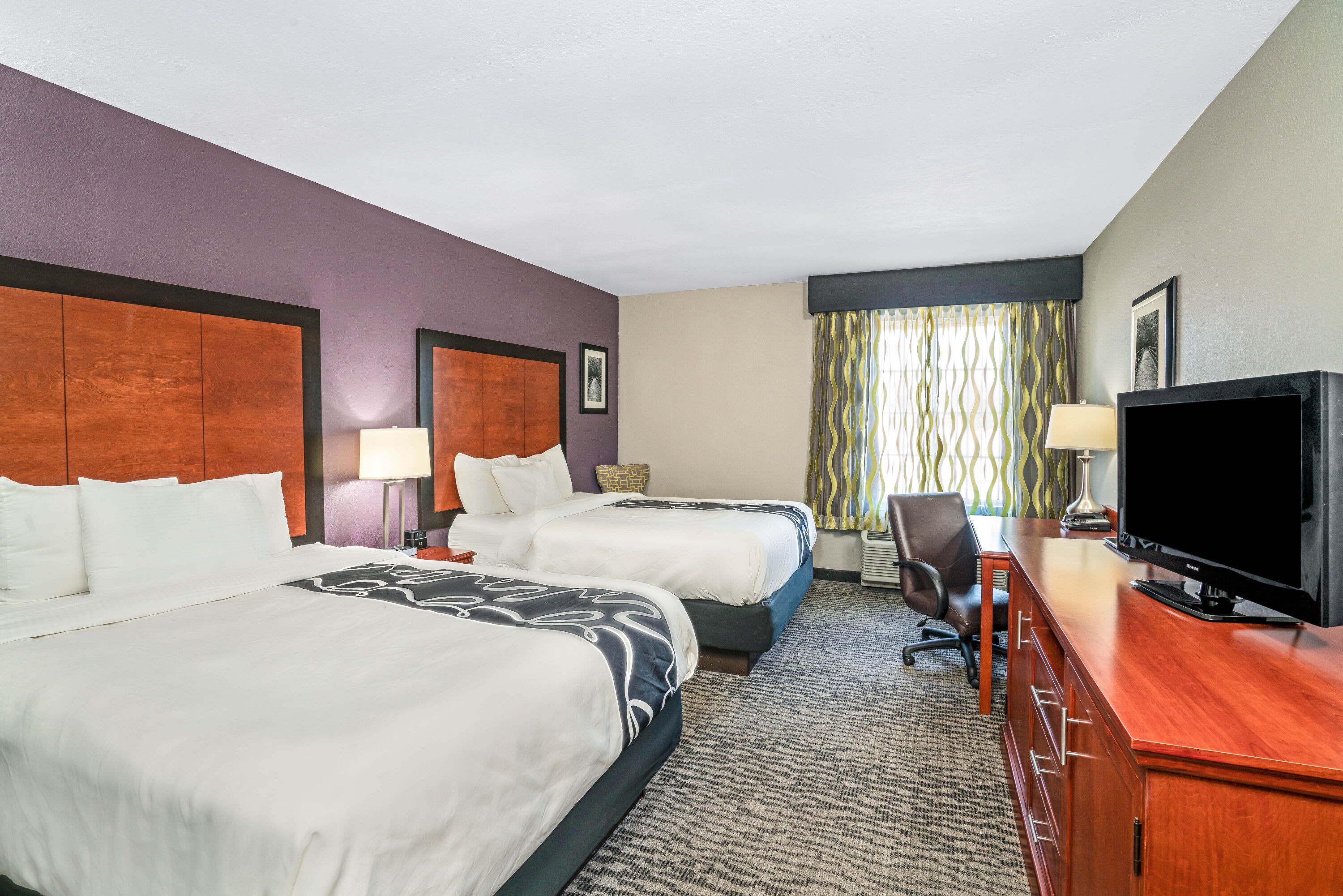 Guest room at the La Quinta Inn & Suites by Wyndham Knoxville North I-75 in Powell, Tennessee