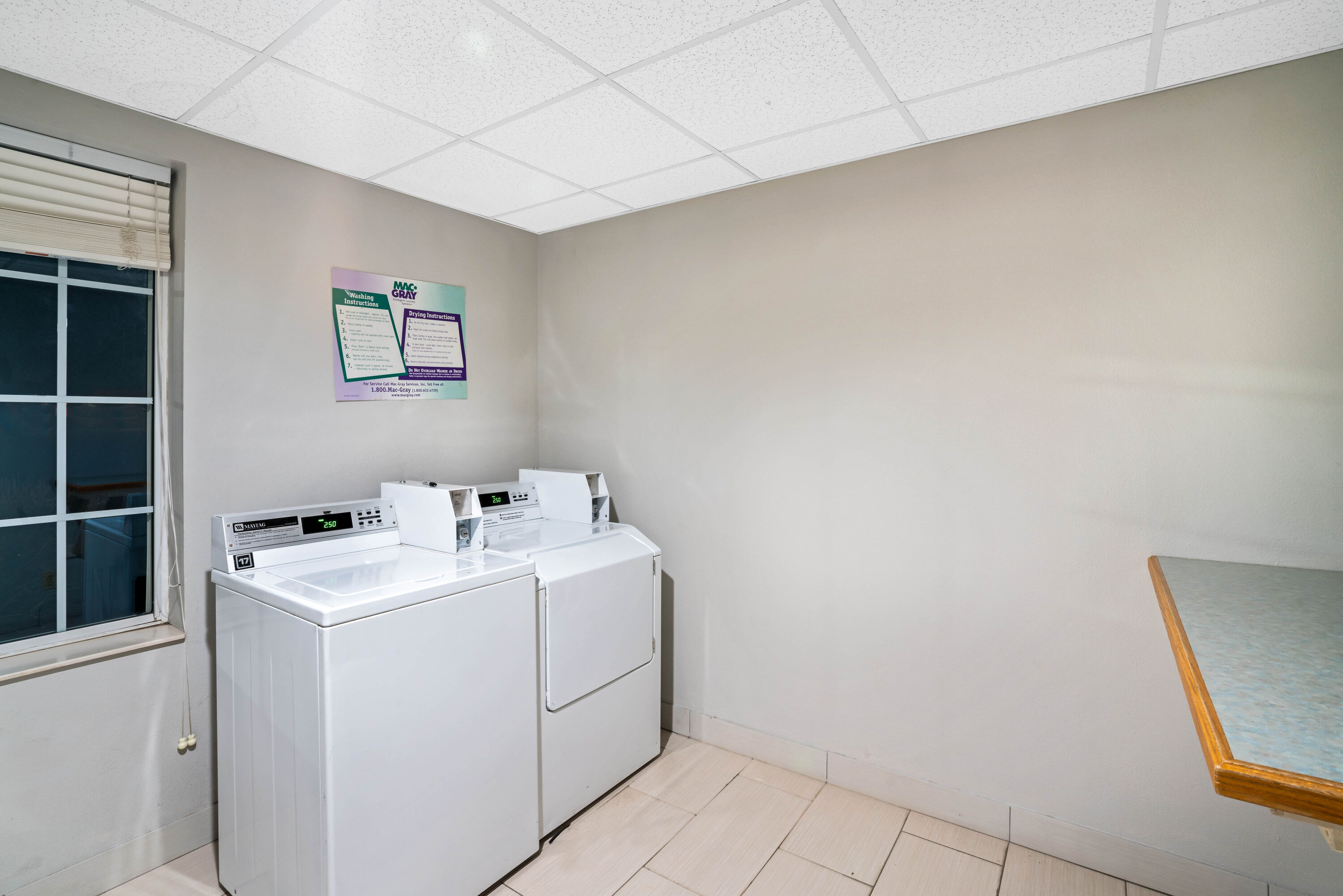 Laundry facilities at La Quinta Inn & Suites by Wyndham Knoxville North I-75 in Powell, Tennessee
