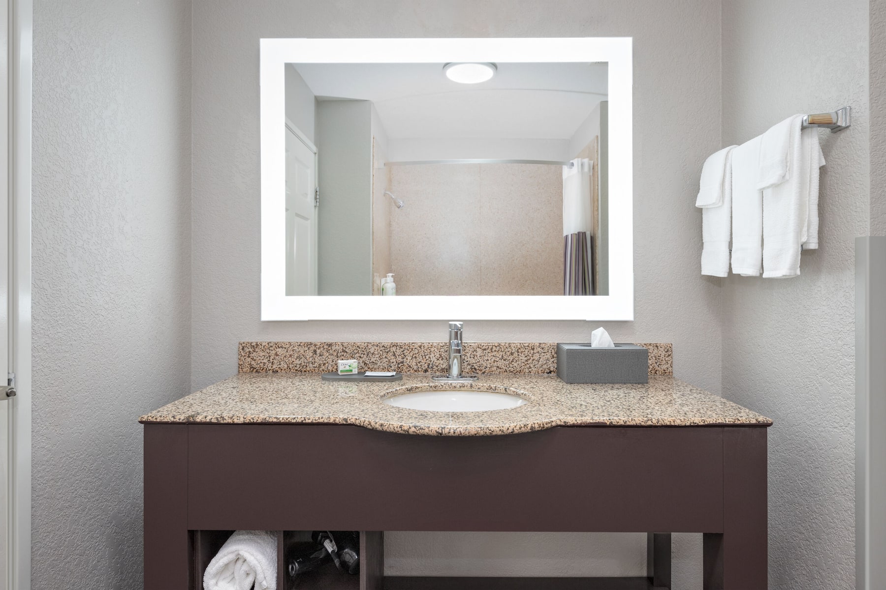 Guest room bath at the La Quinta Inn & Suites by Wyndham Alvarado in Alvarado, Texas